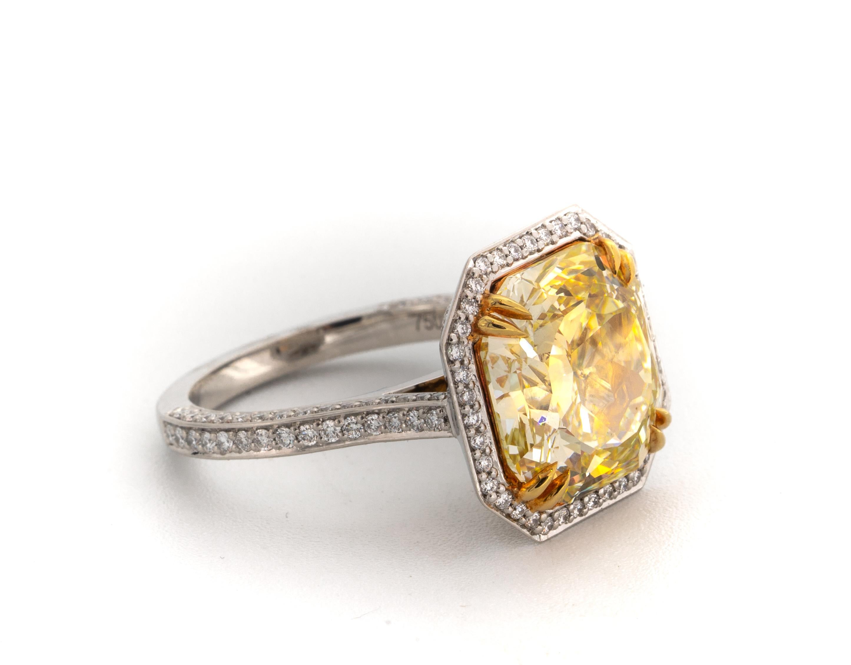 8.02 Carat Fancy Yellow Radiant Cut Diamond Ring , VVS2 Clarity
GIA Grading report Included ( # 2185117929 ) 
Ring is highlighted with  with  154 Round brilliant cut diamond melee weighing an additional .75cts total
Summary:
Center: 8.02 Ct Radiant