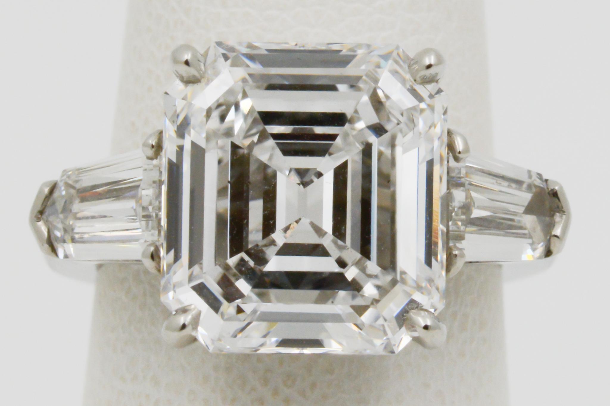 Modern 8.02 Carat GIA Three-Stone 8.02 Carat Emerald Cut Diamond Platinum Ring