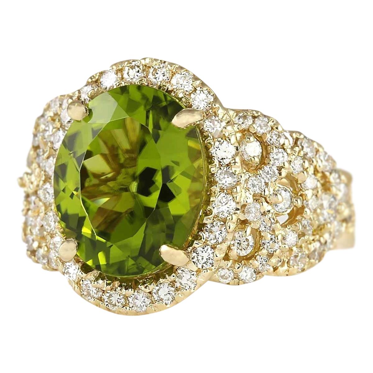 8.02 Carat Natural Peridot 14 Karat Yellow Gold Diamond Ring
Stamped: 18K Yellow Gold
Total Ring Weight: 10.0 Grams
Total Natural Peridot Weight is 6.52 Carat (Measures: 12.00x10.00 mm)
Color: Green
Total Natural Diamond Weight is 1.50 Carat
Color:
