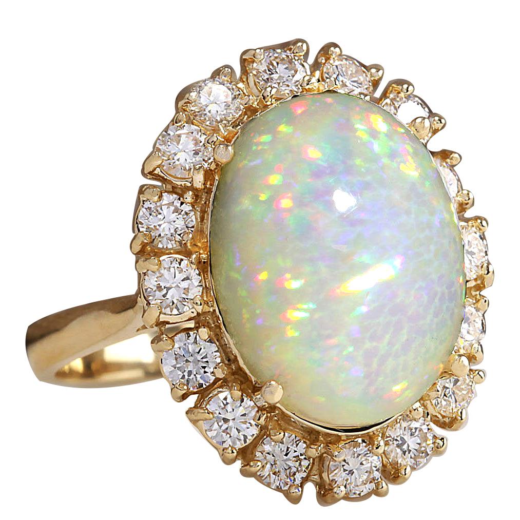 Stamped: 14K Yellow Gold
Total Ring Weight: 7.0 Grams
Total Natural Opal Weight is 6.70 Carat (Measures: 16.00x12.00 mm)
Color: Multicolor
Total Natural Diamond Weight is 1.33 Carat
Color: F-G, Clarity: VS2-SI1
Face Measures: 22.80x18.30 mm
Sku:
