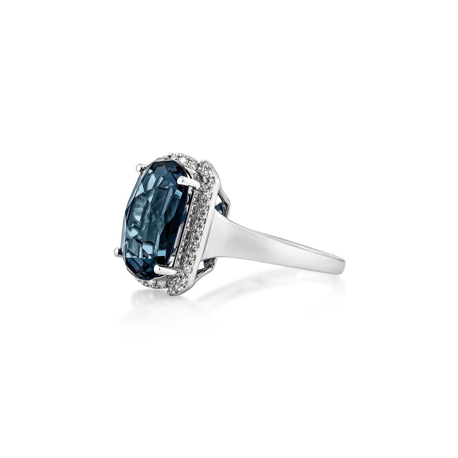Oval Cut 8.04 Carat London Blue Topaz Fancy Ring in 18Karat White Gold with Diamond. For Sale