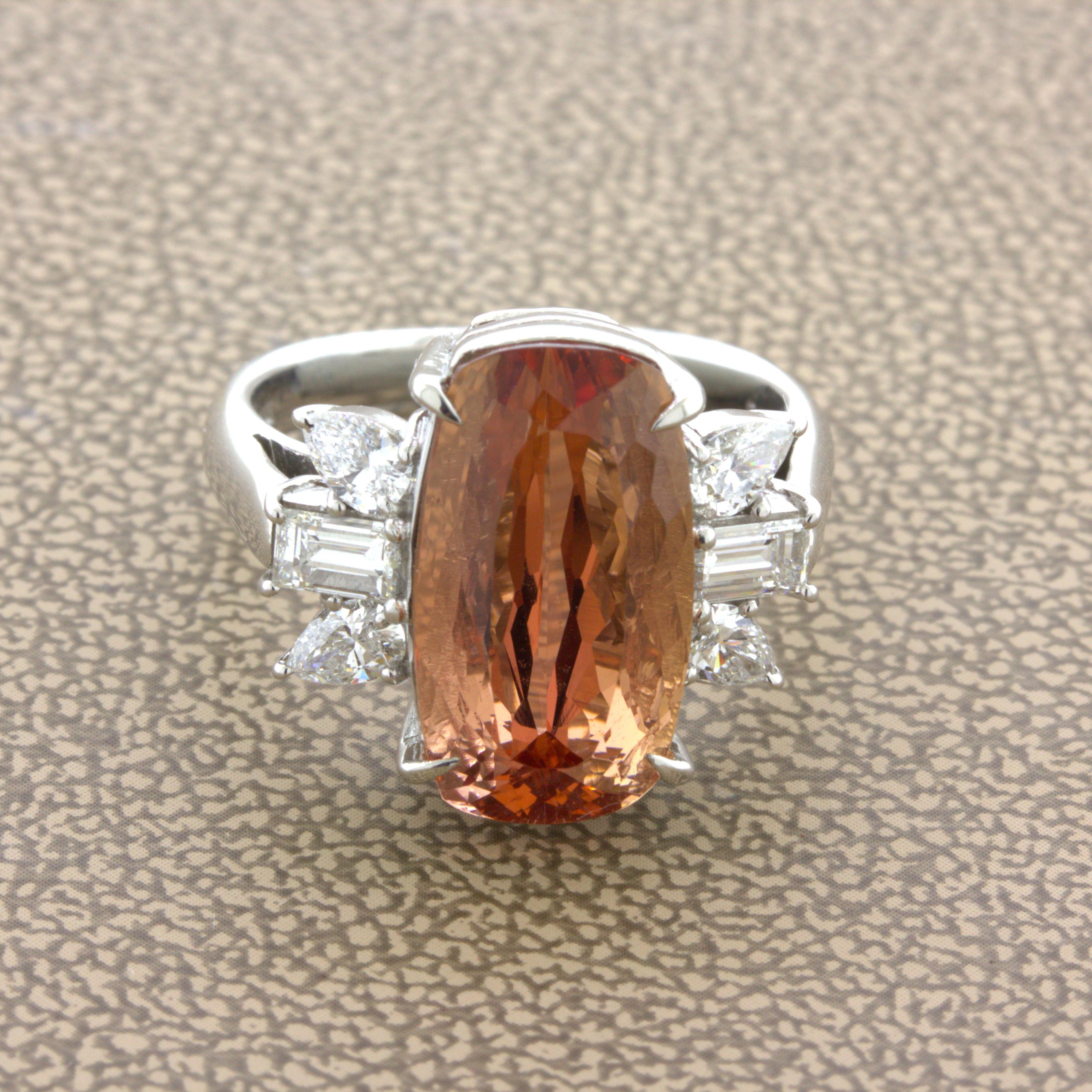 A chic and elegant platinum ring featuring a very fine imperial topaz. It weighs an impressive 8.05 carats and has a unique intense red orange flame color not seen in any other gemstone. Adding to that, the topaz has a sleek elongated cushion-cut