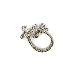 8.05 Carat Round Brilliant O-I VS and Baguette Shape Diamond Platinum Pin