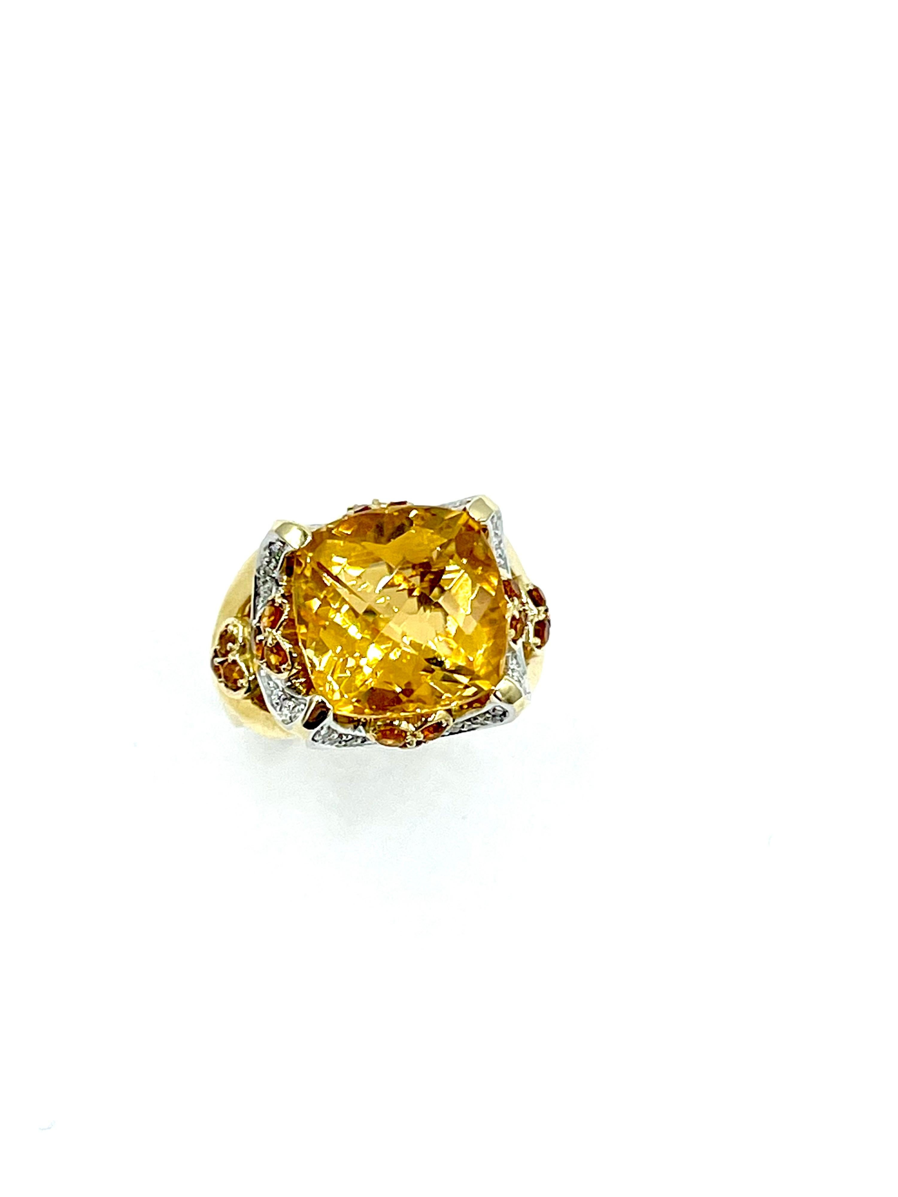 A beautiful and fun fashion ring for all!  The faceted cushion Citrine is 8.07 carats, set in four prongs with a single row of diamonds extending to the prongs on each side.  There is also small clusters of three round cut citrines set on all four