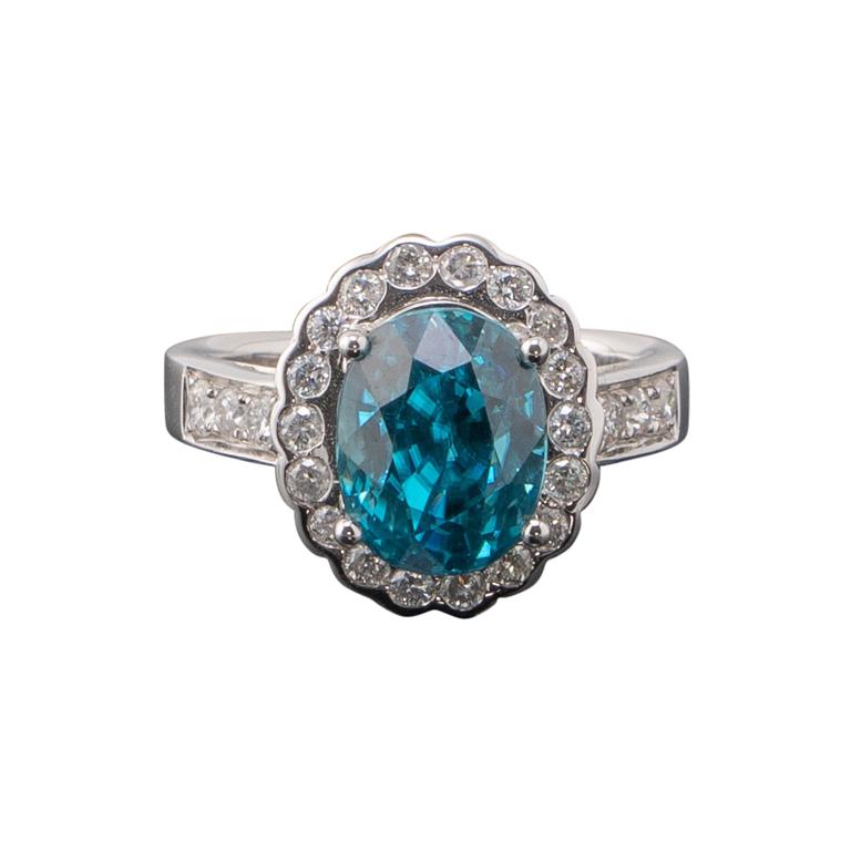 8.09 Carat Oval Blue Zircon and Diamond 18k Gold Engagement Ring For Sale
