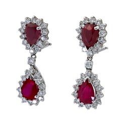 8.09 Carat Pear Shape Ruby and Diamond Halo Dangle Earrings