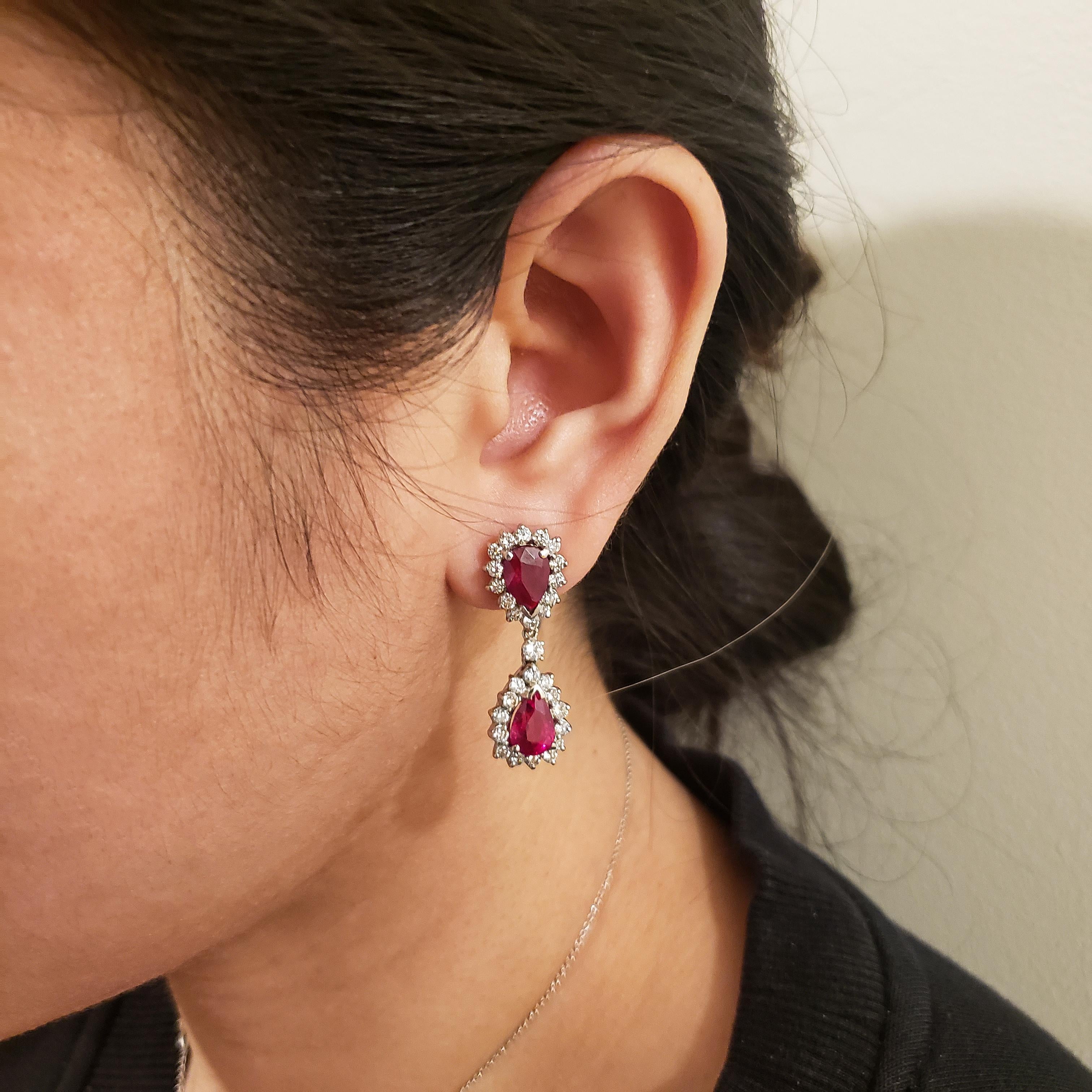 8.09 Carat Pear Shape Ruby and Diamond Halo Dangle Earrings In New Condition For Sale In New York, NY