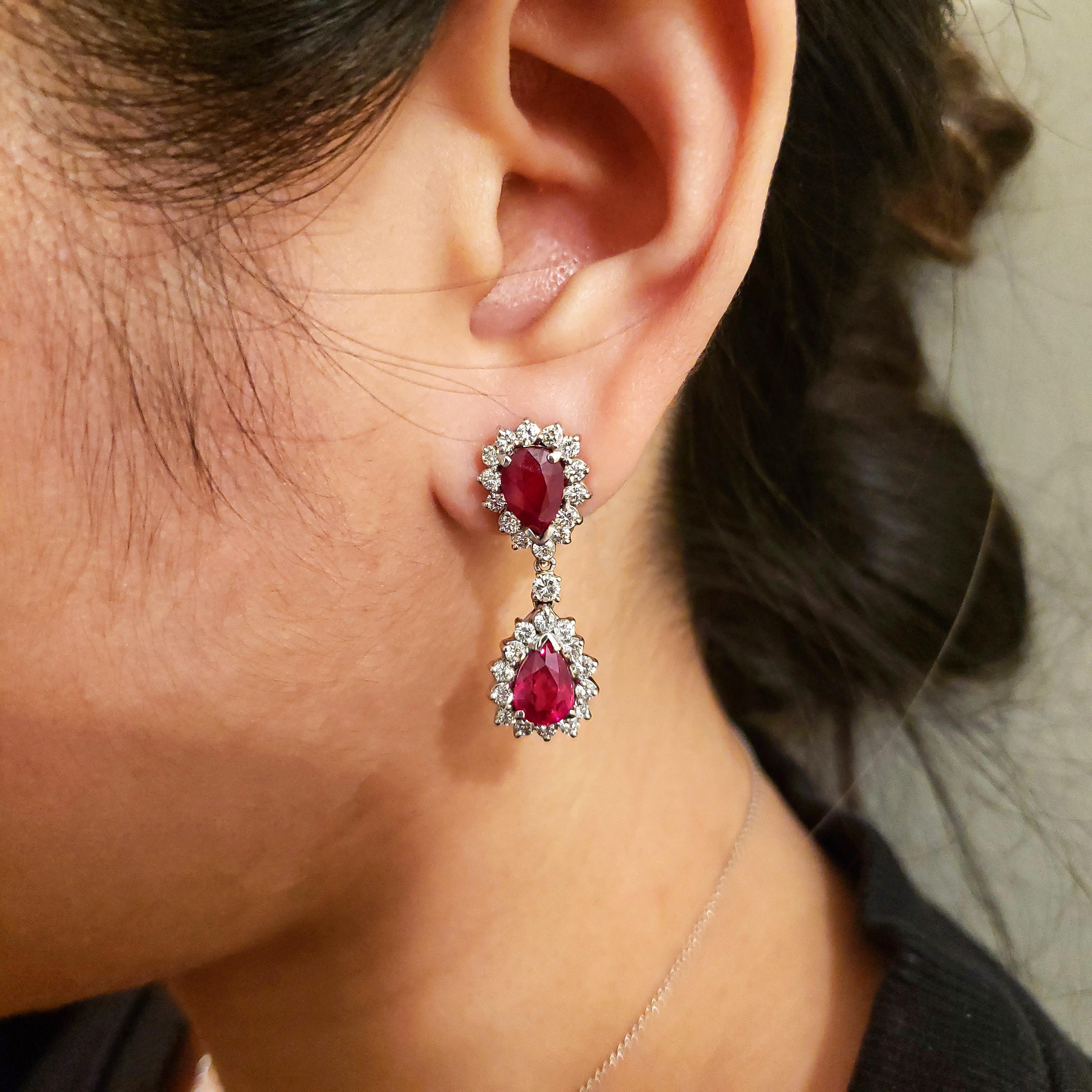 Women's 8.09 Carat Pear Shape Ruby and Diamond Halo Dangle Earrings For Sale