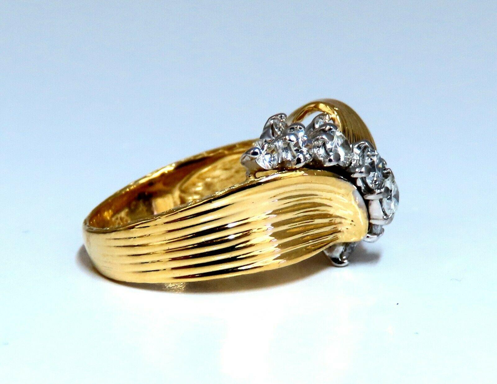Regency Deco Wire Wrap Knot Ring

.80ct. Natural diamonds ring

G-color Vs-2 clarity 

Very good Cuts / Full cut Brilliants

18kt yellow gold

Ring size: 6

(Complimentary resizing available)

Ring is 12.7mm wide

7.8mm depth.

$4000 Appraisal