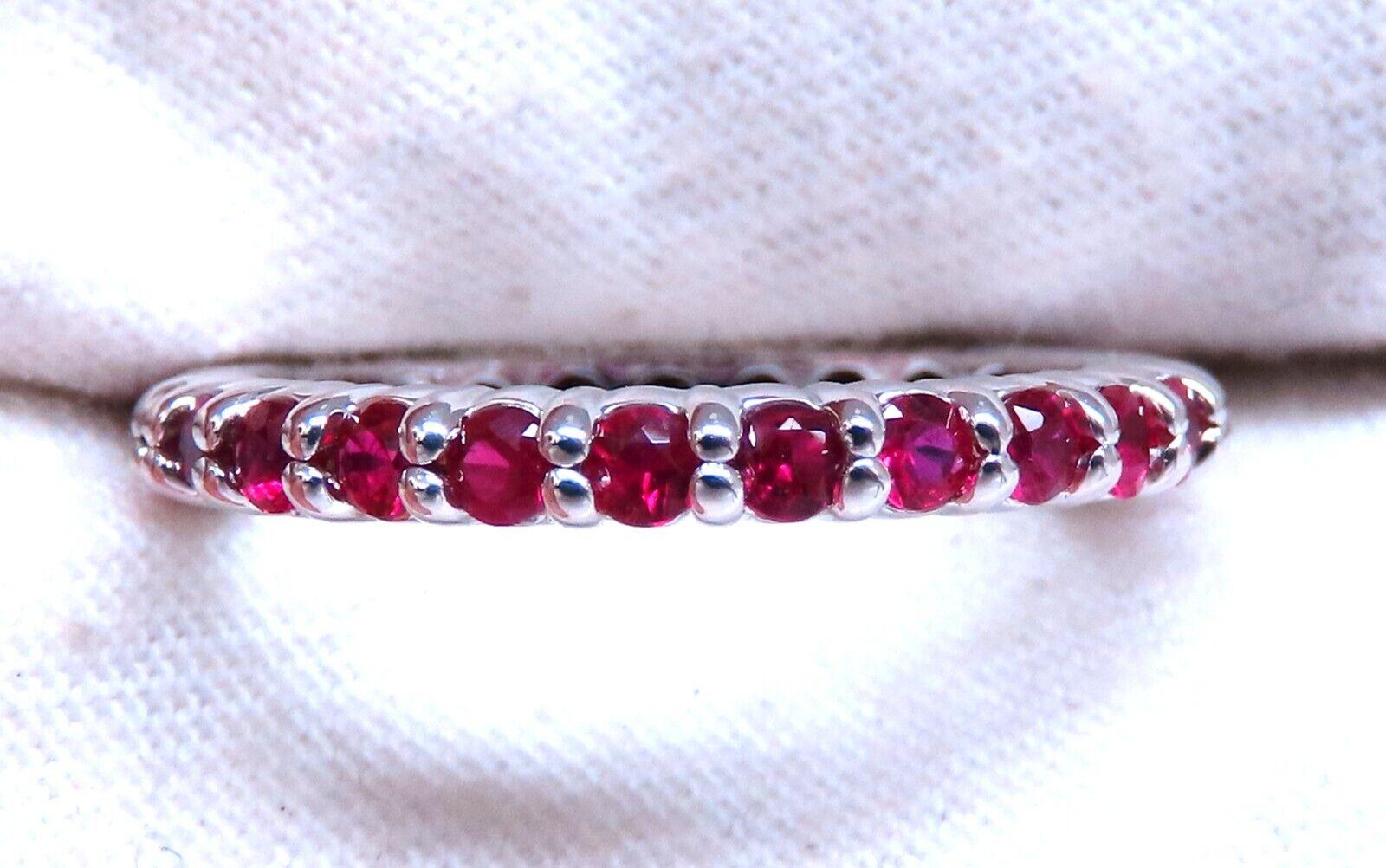 .80ct. Round cut Natural Rubies eternity band

Rubies:

Clean Clarity & full round cuts.

Transparent & Vivid red colors.

 14kt white gold

2.9 grams.

2.5mm wide

Depth: 2.4mm

 ring size: 6

can not be resized 