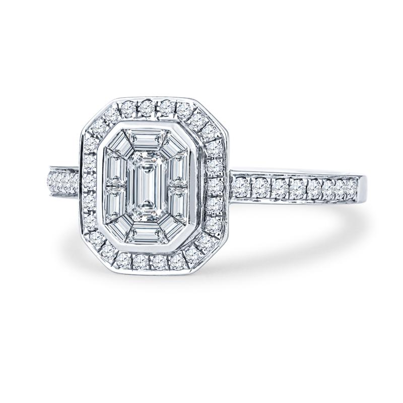 This engagement ring features 0.80ctw in baguette and round diamonds, set in an 18kt white gold ring. It is a size 6.5 but can be resized smaller or larger upon request.