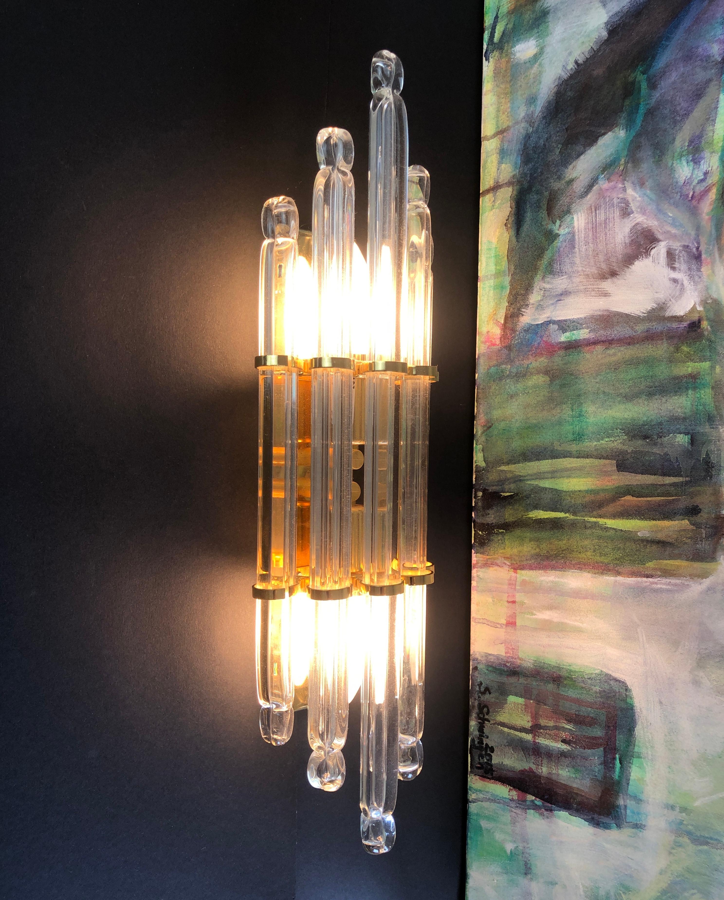 Magnificent wall lamp by 'Kolarz Leuchten', Austrias famous early 20th century up to today manufacturer of high-end design lighting.
Attributed to Paolo Venini.
Comes in 5 hand made crystal glas 'sticks', the front one the longest and then cascading