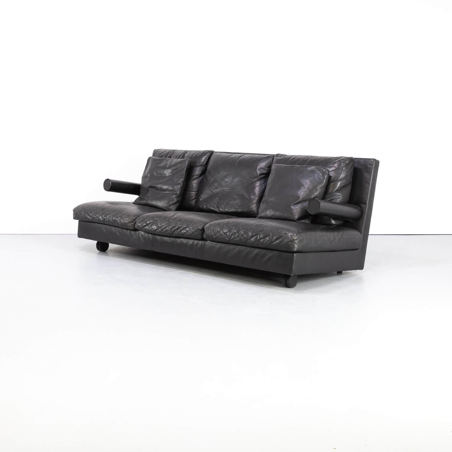 The single-seat fauteuil model Baisity created in 1986 by Antonio Citterio won the Compasso d’oro a year later with this design. Followed with a Baisity three seat sofa. Beautiful and comfortable seating and very rare. The sofa has two wheels