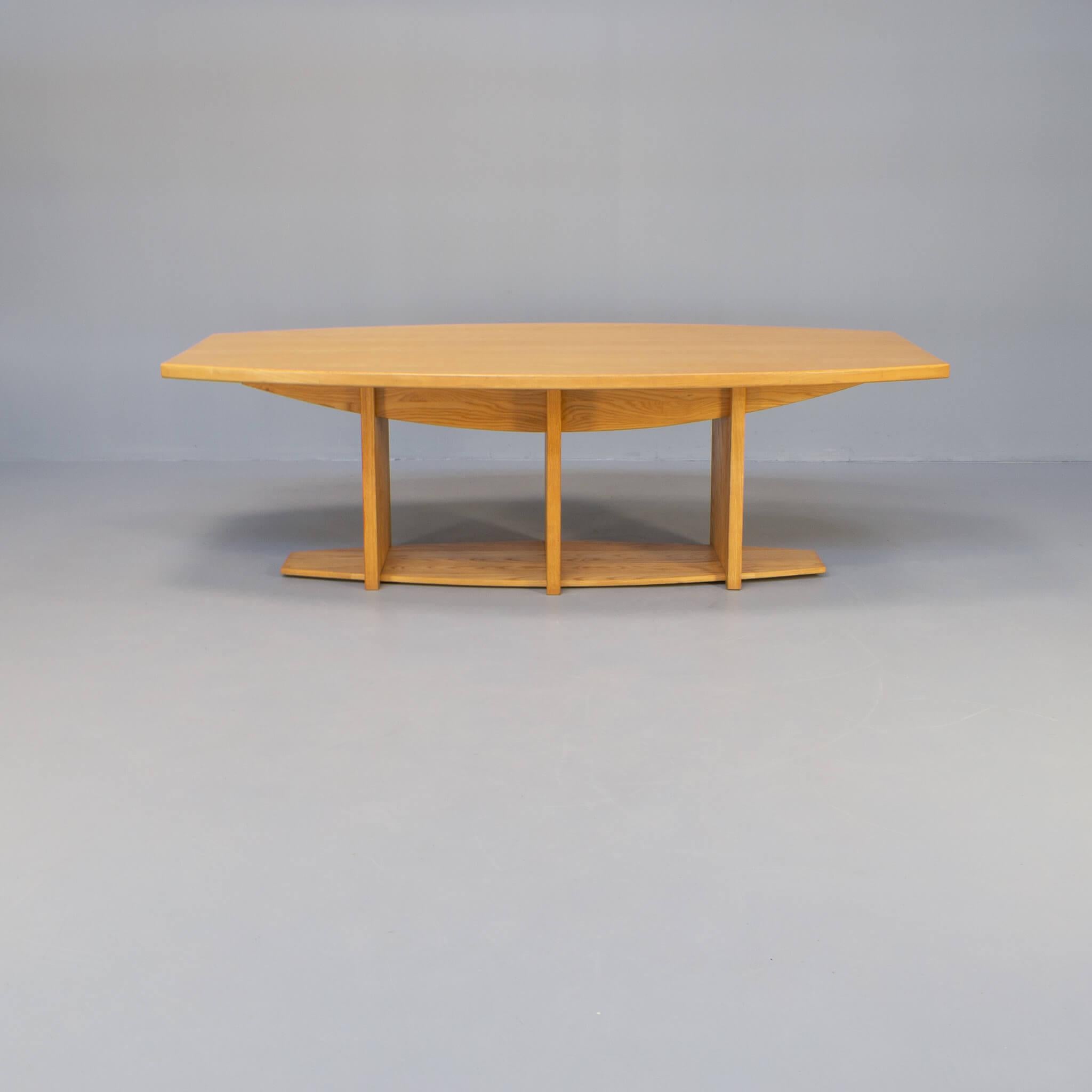 Ash wood is a desirable wood structure. Fresh, friendly and luxury. This table has a slight oval form and is architectural developed for in house use of a private collectioneer. The table easily fits 4 chairs at the long side so a set of 8 chairs is
