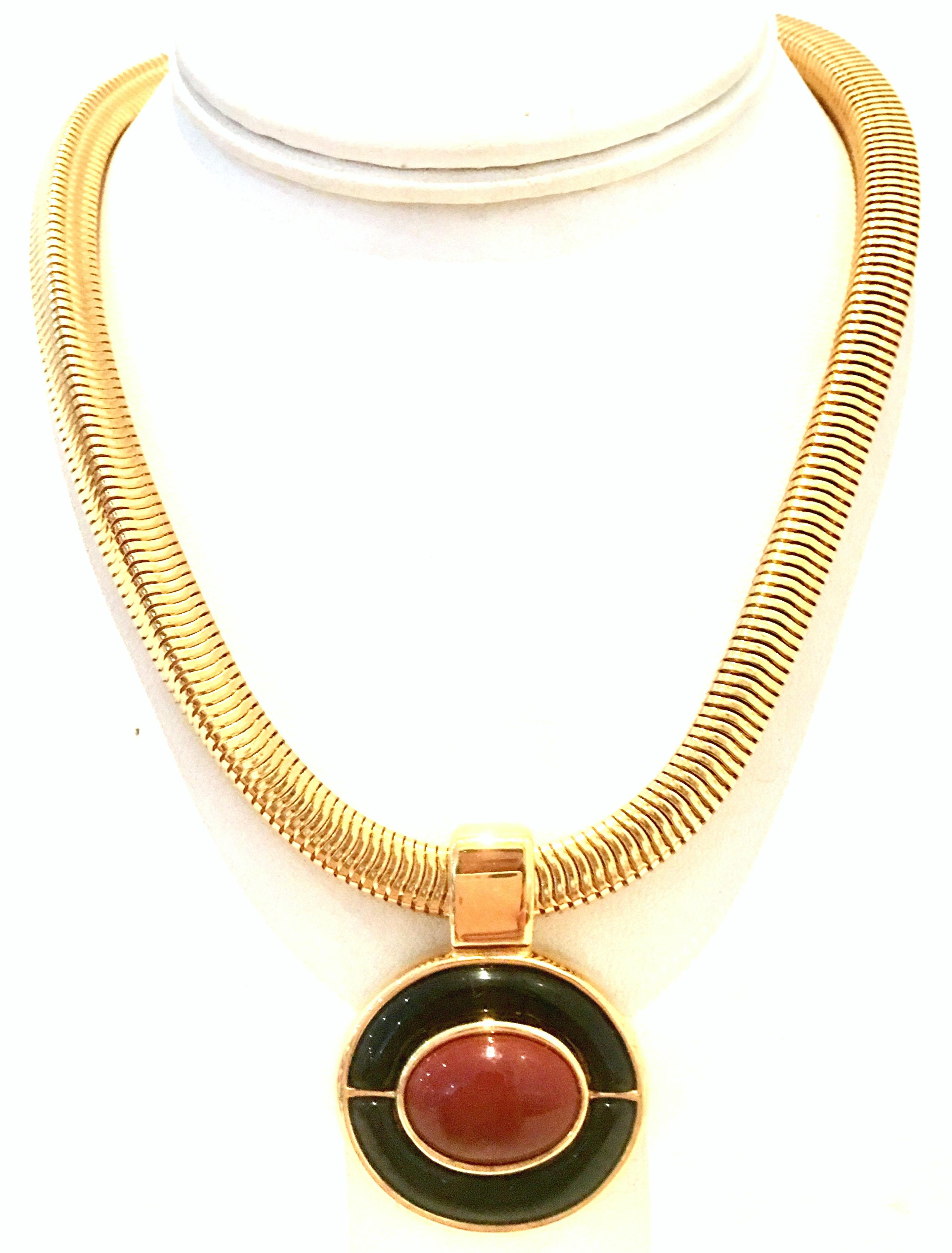 1980'S Gold Plate & Enamel Abstract Pendant Choker Style Necklace By, Monet. This chunky and substantial choker style necklace features an Art Deco inspired gold plate and black enamel with faux carnelian central stone pendant. The necklace is .25