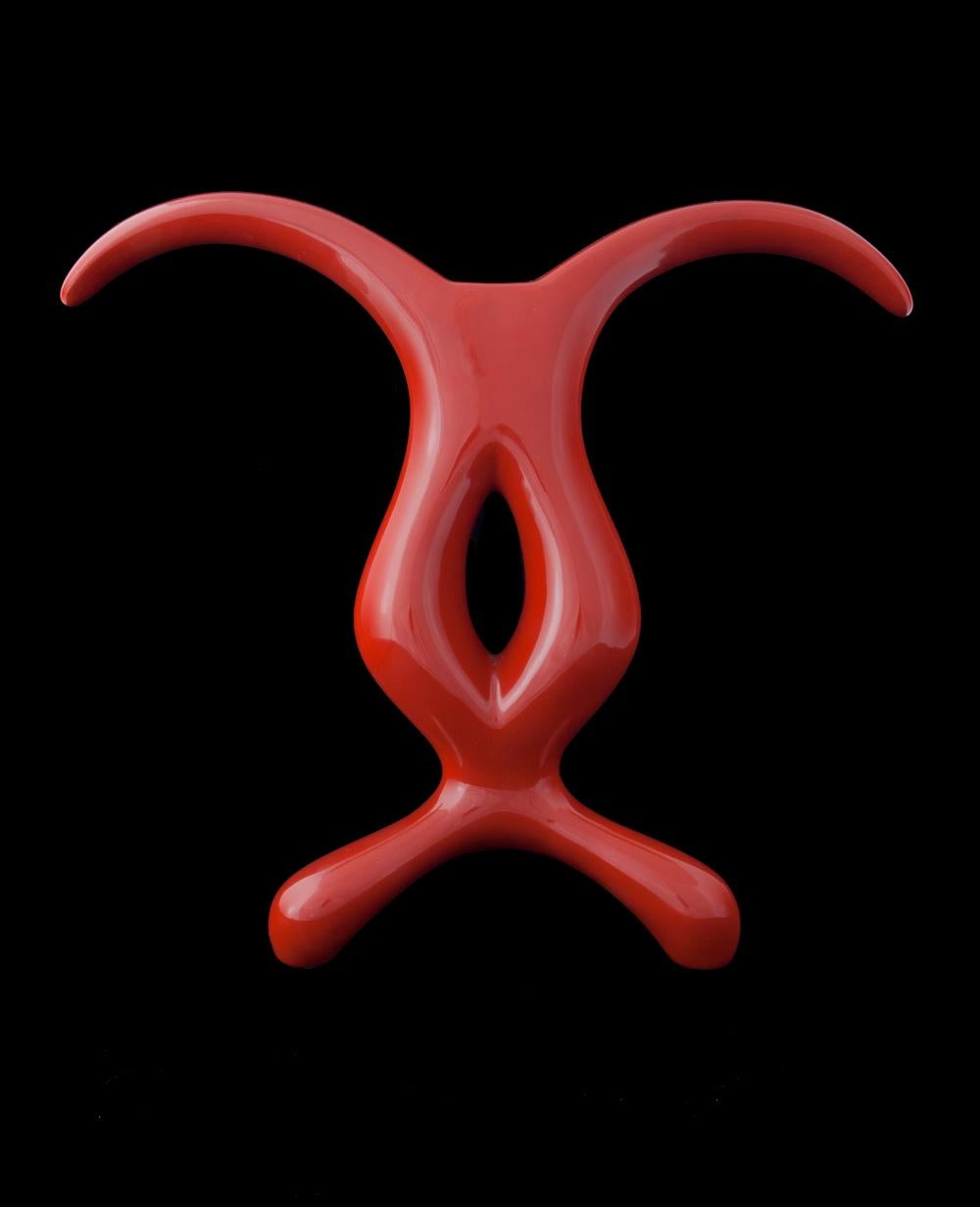 Anna Gili's single flower vase  CRO is a home sculpture-vase which is firmly supported by three feet; it frees its arms into space to evoke the powerful grace of a mysterious winged metaphor. A gesture of reverence and gratitude to Mother Earth, and