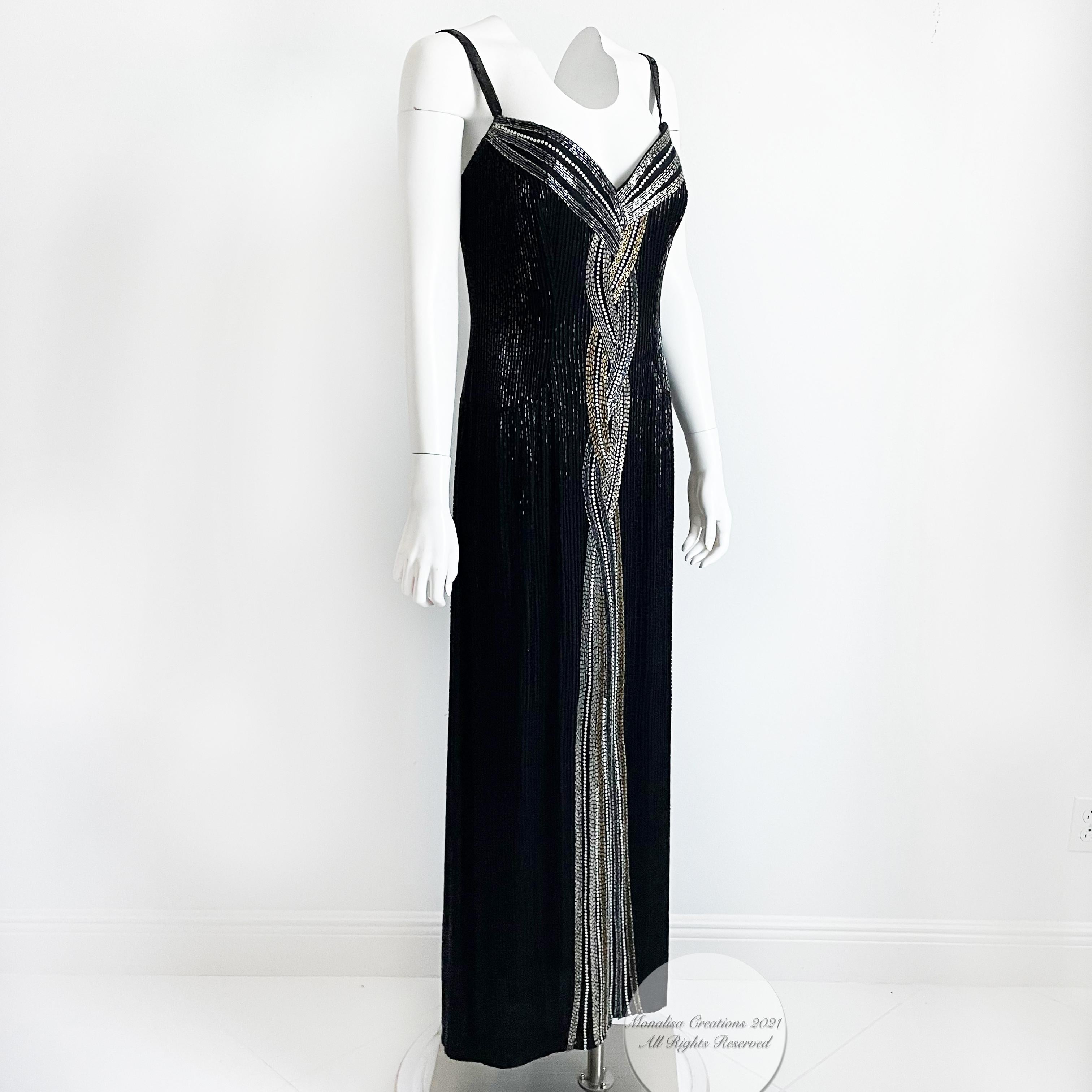 This fabulous evening gown was made by Bob Mackie in 1982, around the time he opened his ready-to-wear boutique. Made from black silk, it's covered in tons of black jet beads and features a braid of silver and gold beads and white rhinestones at the