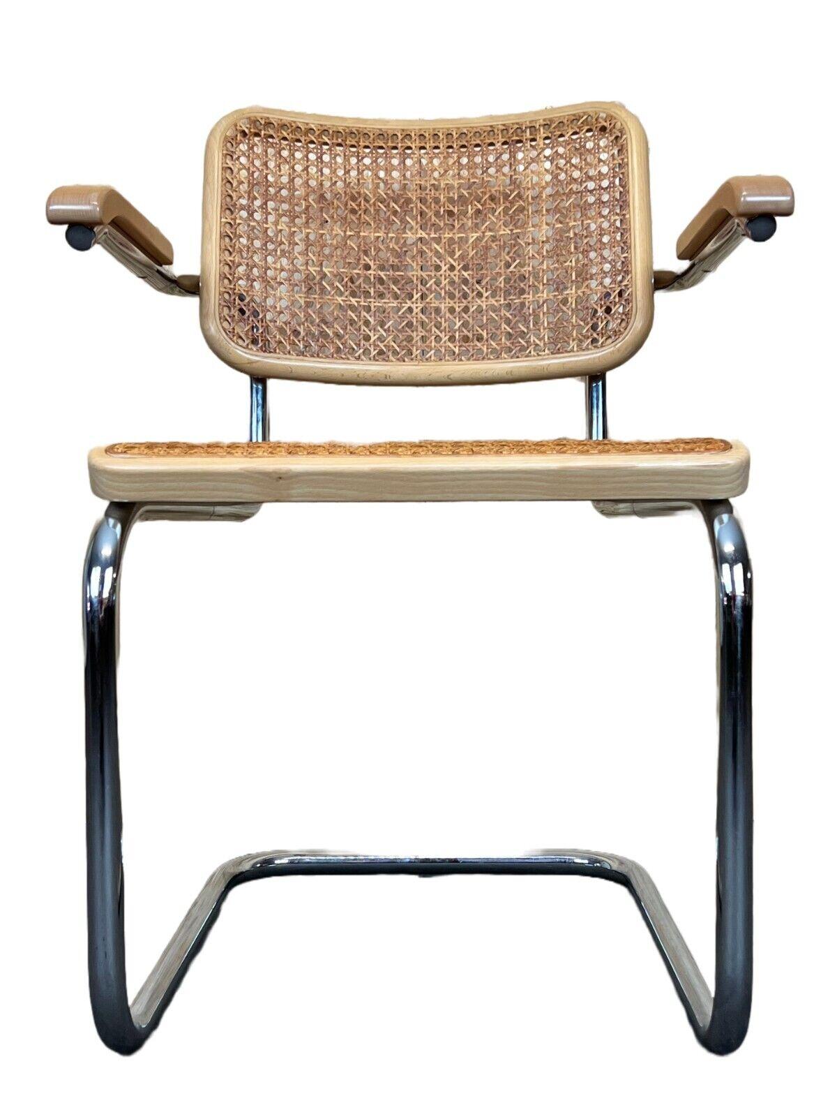 chaise 80s Freischwiner Thonet 96 chrome accoudoir chaise maille design

Objet : fauteuil

Fabricant : Thonet

Condition : bon - vintage

Âge : environ 1980

Dimensions :

58cm x 60cm x 80cm
Hauteur du siège = 44cm

Autres notes