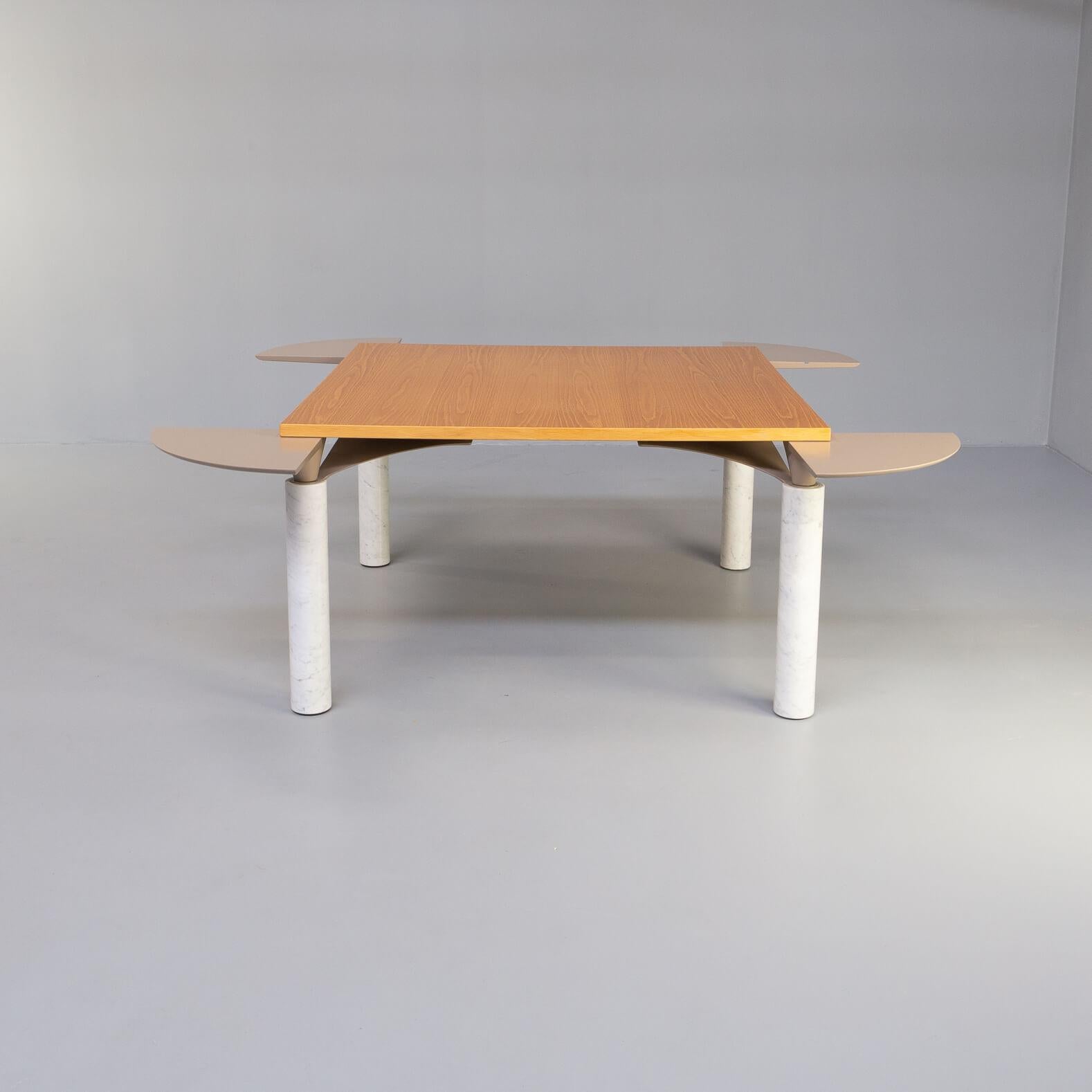 Convertible dining table Model LOM850 was designed in the 1980s by Francesco Binfare and produced by Cassina This is a very rare version with Carrara marble legs, produced in very limited number. The typical version of this model was with wooden