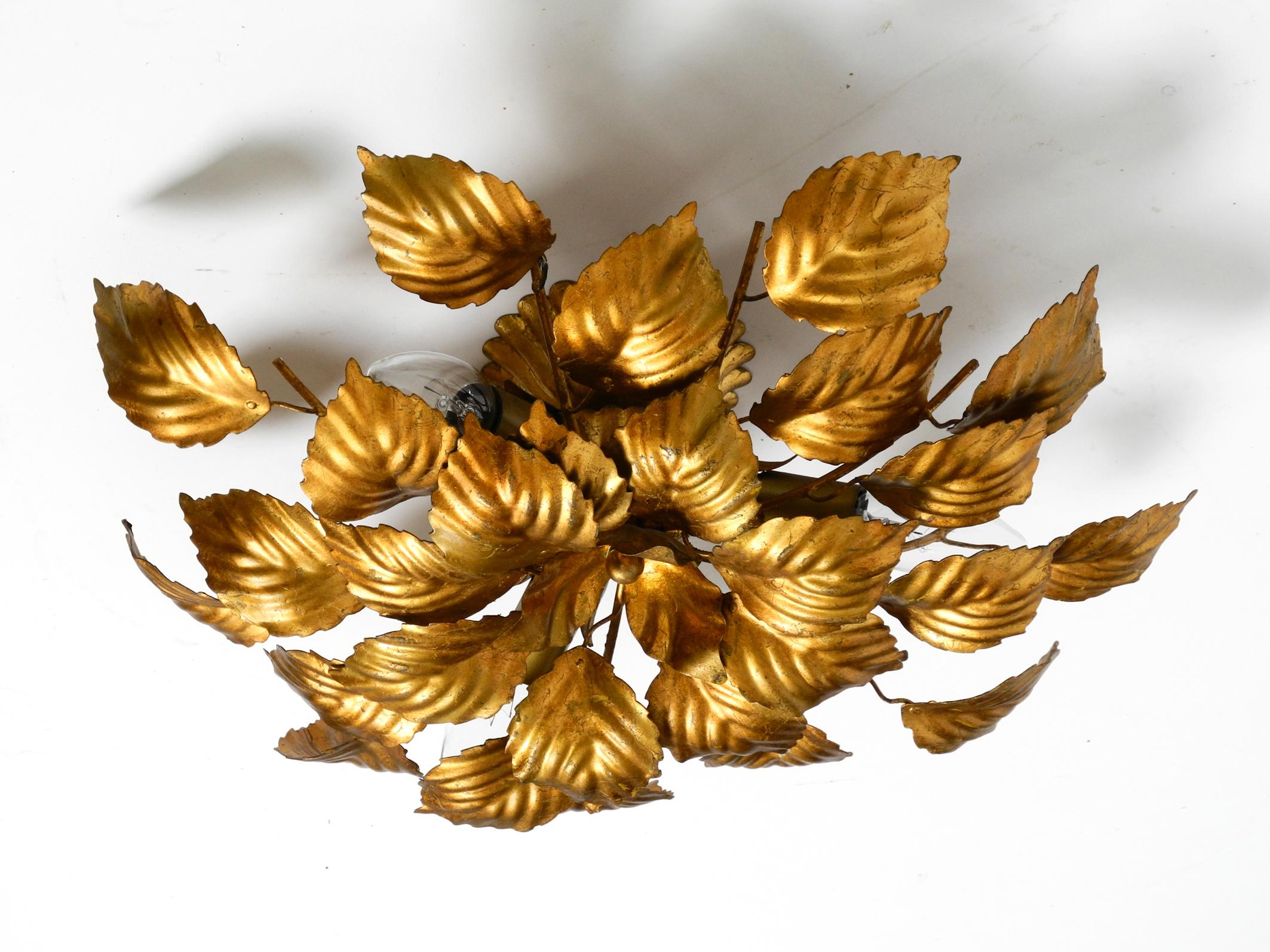 European 80s gold-plated floral ceiling lamp with large leaves in Regency design For Sale