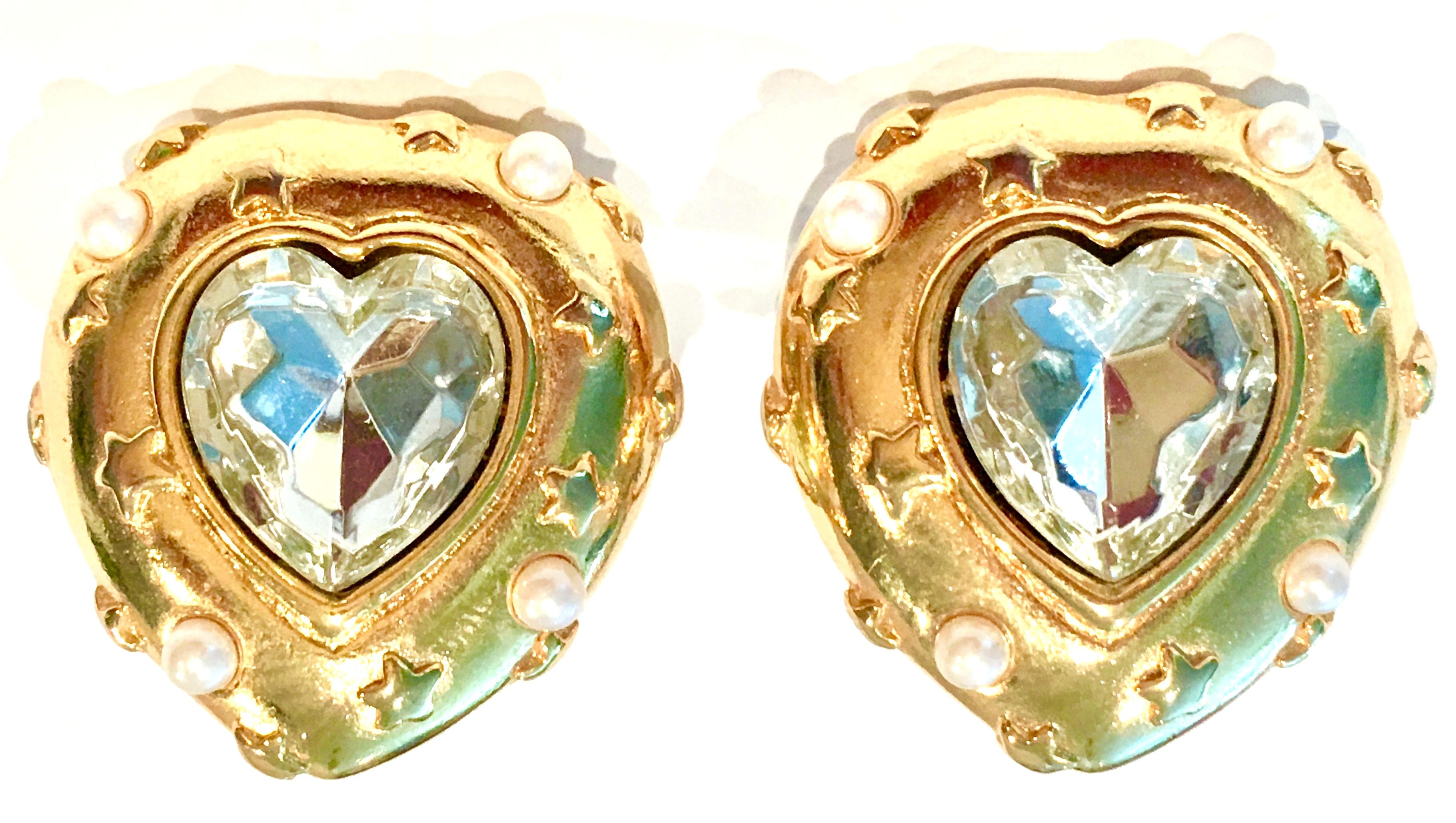 1980'S Gold Plate, Faux Pearl Bead & Faceted Cut Crystal Swarovski Rhinestone Heart & Star Earrings By, Trifari. Features gold plate setting with large central crystal stone, faux pearl beads and raised star detail. Signed on the underside of the