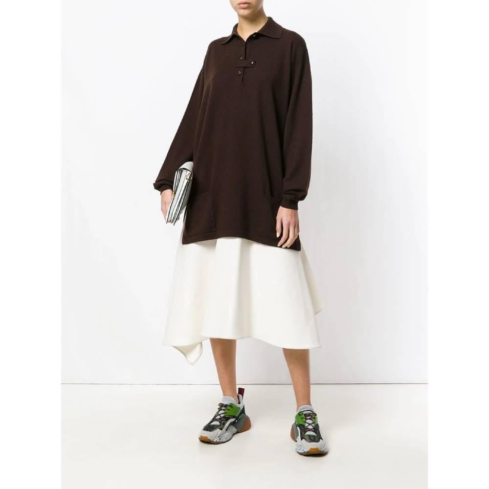 Jc De Castelbajac brown wool maxi sweater. Polo collar, low shoulders, long sleeves, thight ribbed cuffs, front buttoning with coffee bean-shaped buttons and two patch pockets on the front.

Size: 44 IT

Flat measurements
Height: 82 cm
Bust: 58