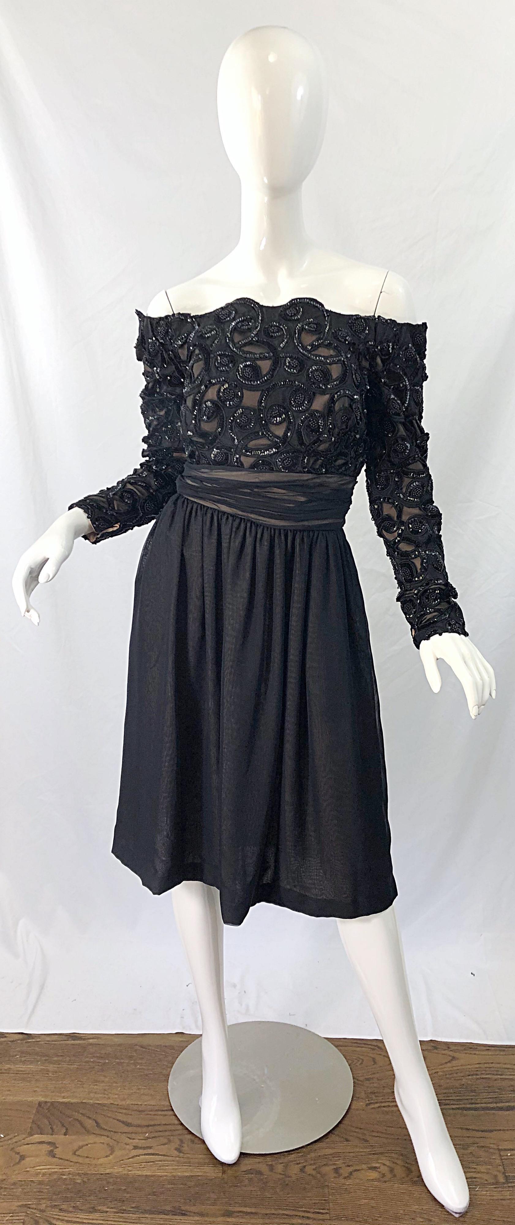 Late 1980s KEVAN HALL COUTURE black off-the-shoulder sequin dress ! Features a nude chiffon underlay with a lace nad sequin bodice. Flowy silk chiffon skirt. Boned bodice. Hidden zipper up the back with hook-and-eye closure. The perfect little black