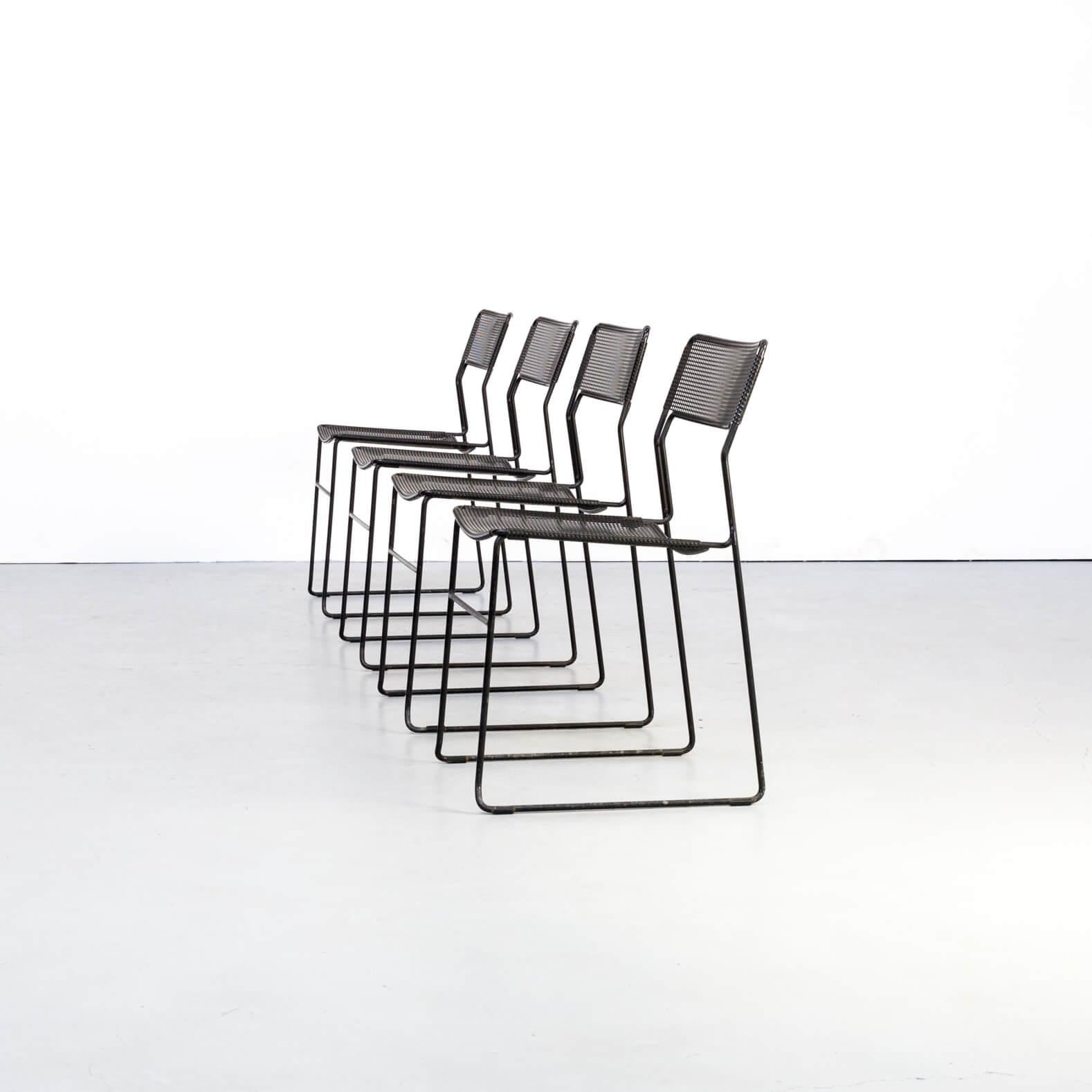 Nice set of 4 stackable black lacquered metal dining chairs.