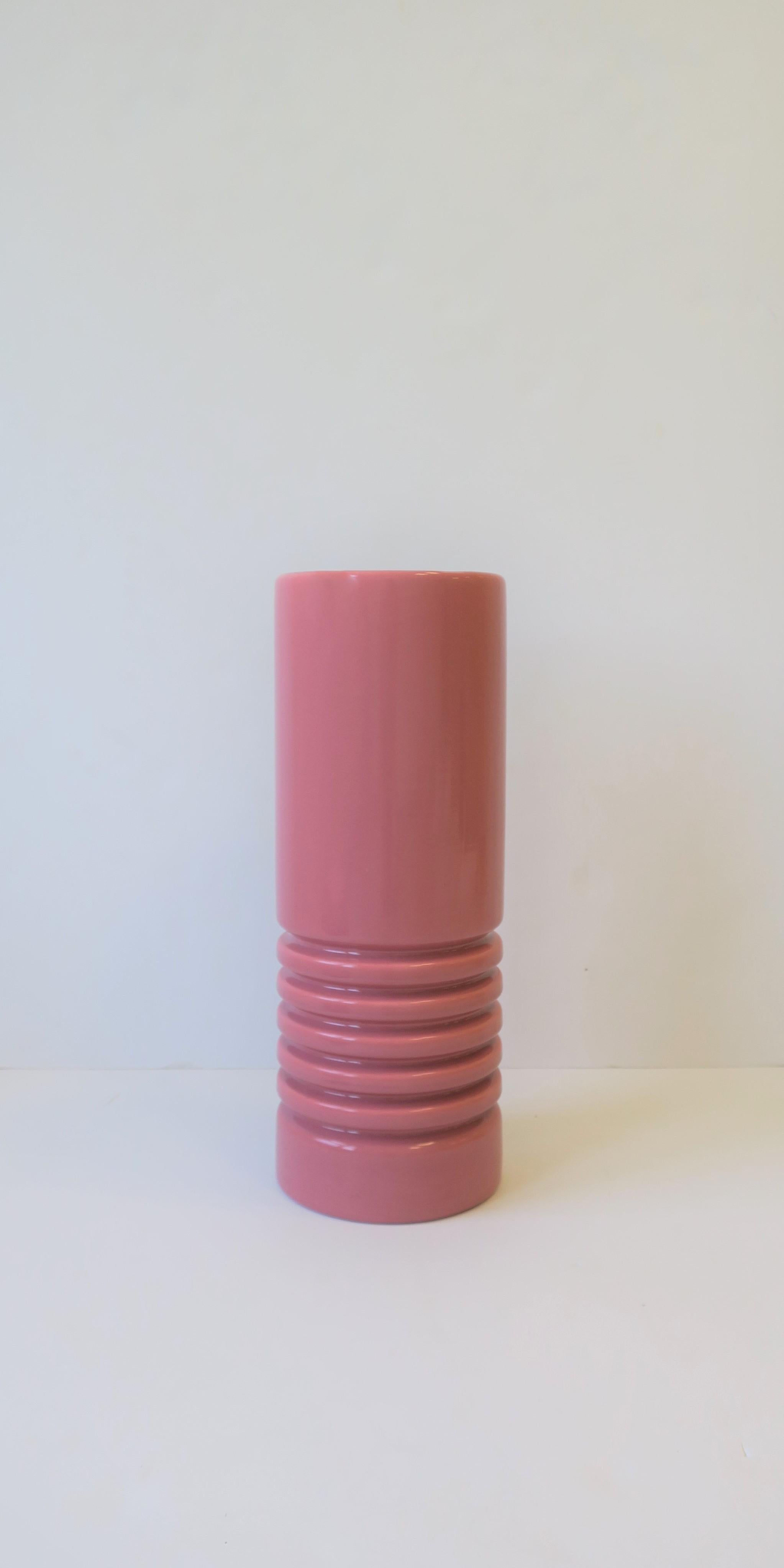 A very beautiful, relatively tall, Post-Modern period or Modern/Art Deco style pink ceramic vase by Haeger pottery, circa 1980s, USA. With maker's mark on bottom as show in image #9. Very clean inside, appears to have never been used.

Vase
