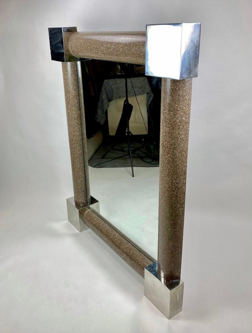The unique, Italian Modern design of this gorgeous, monumental mirror features a dazzling oversized frame of terrazzo accentuated at each corner by polished steel cubes. This full length mirror can be positioned on the floor (leaning against a wall)