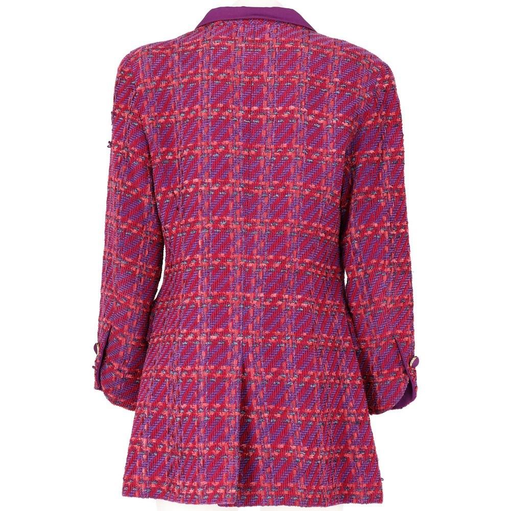 Nina Ricci fuchsia and purple bouclé wool fitted jacket with classic revers collar, two welt pockets with flaps, frontal buttons fastening. Padded shoulders.

Size: 44 IT

Flat measurements
Height: 81 cm
Bust: 47 cm
Sleeves: 56 cm
Shoulders: 42