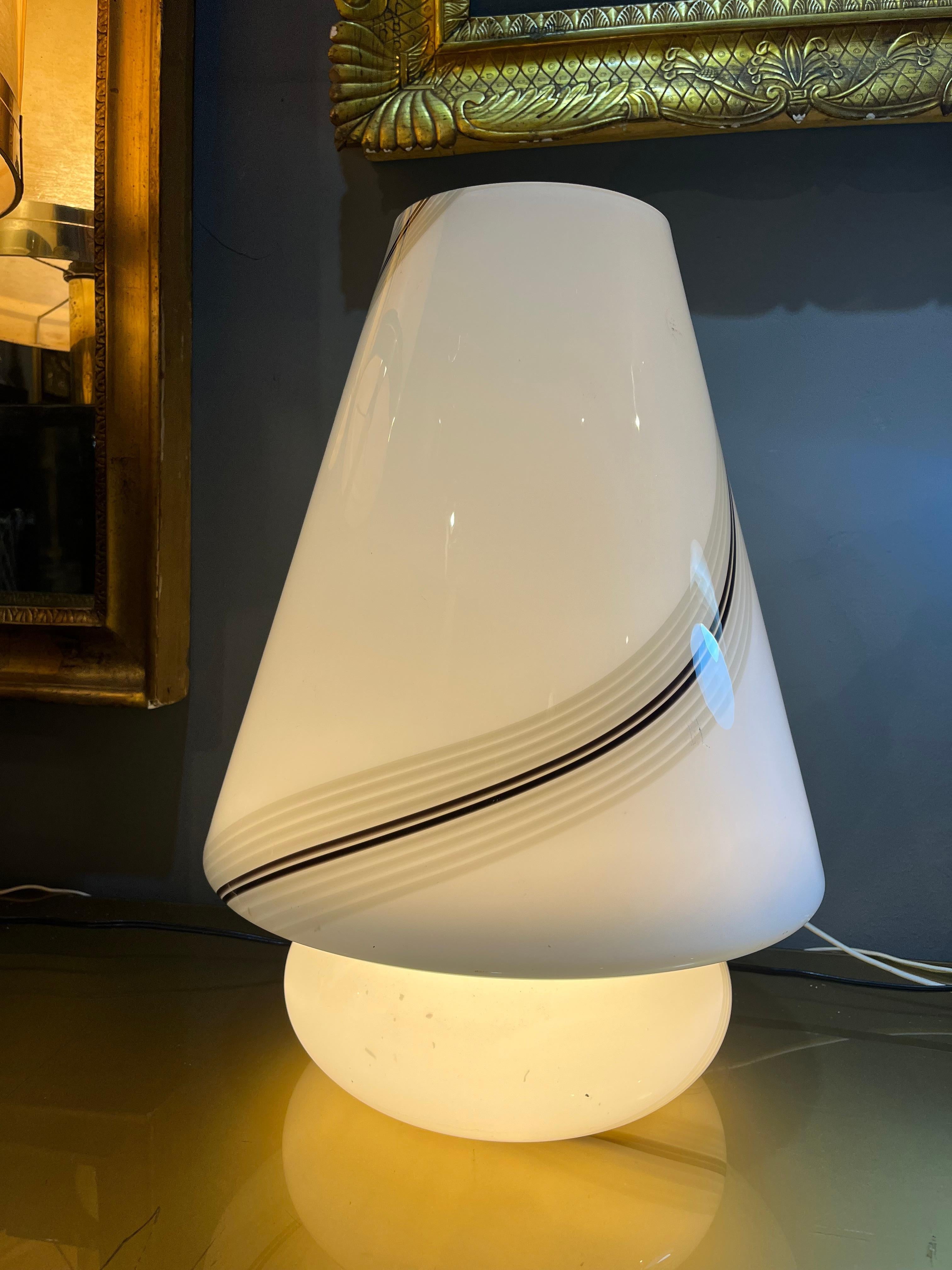 opaline murano glass lamp from the 80s by the master glassmakers of murano. Product in good condition with small wear caused by the years and use. Venetian glass art has very ancient roots and harks back to Roman and Byzantine knowledge. When it
