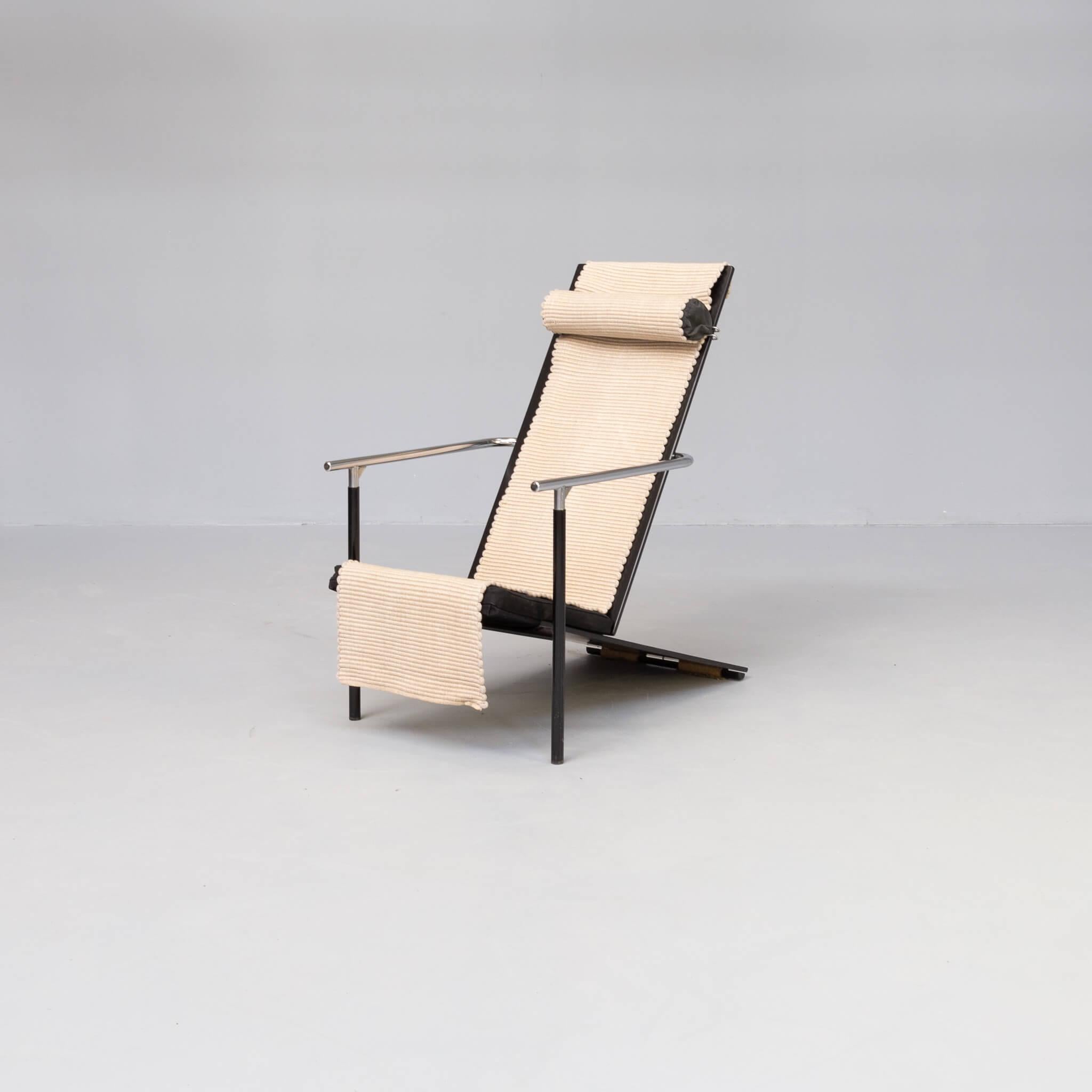 The Inna armchair designed in 1982 by student designer Pentti Hakala. Produced by Inno-tuote Oy, Finland. This Minimalist chair was designed to be assembled by the first buyer. The materials are steel and plywood. Sprung casters on the rear of