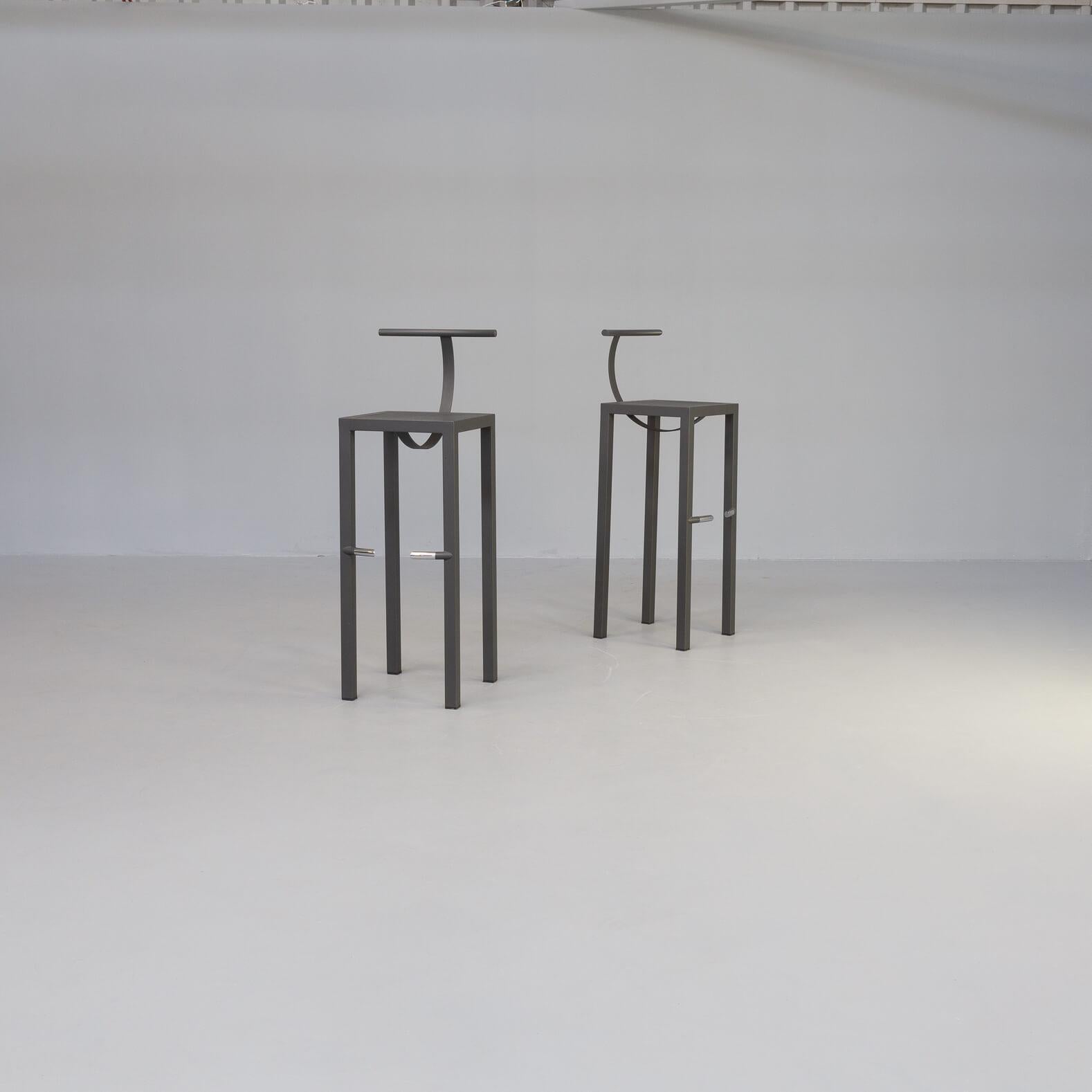 Philippe Starck designed the saparis stool in the 1980s combining straight and round forms together. Tubular steel frame mesh seat and half cirkel round backrest. The stools have been available in two heights. This version concerns the 107cm height