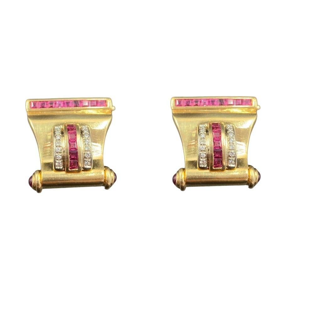 80's diamond, ruby and gold ear clip and pin. The pin detaches to make a pair of ear clips. 

18K Gold 