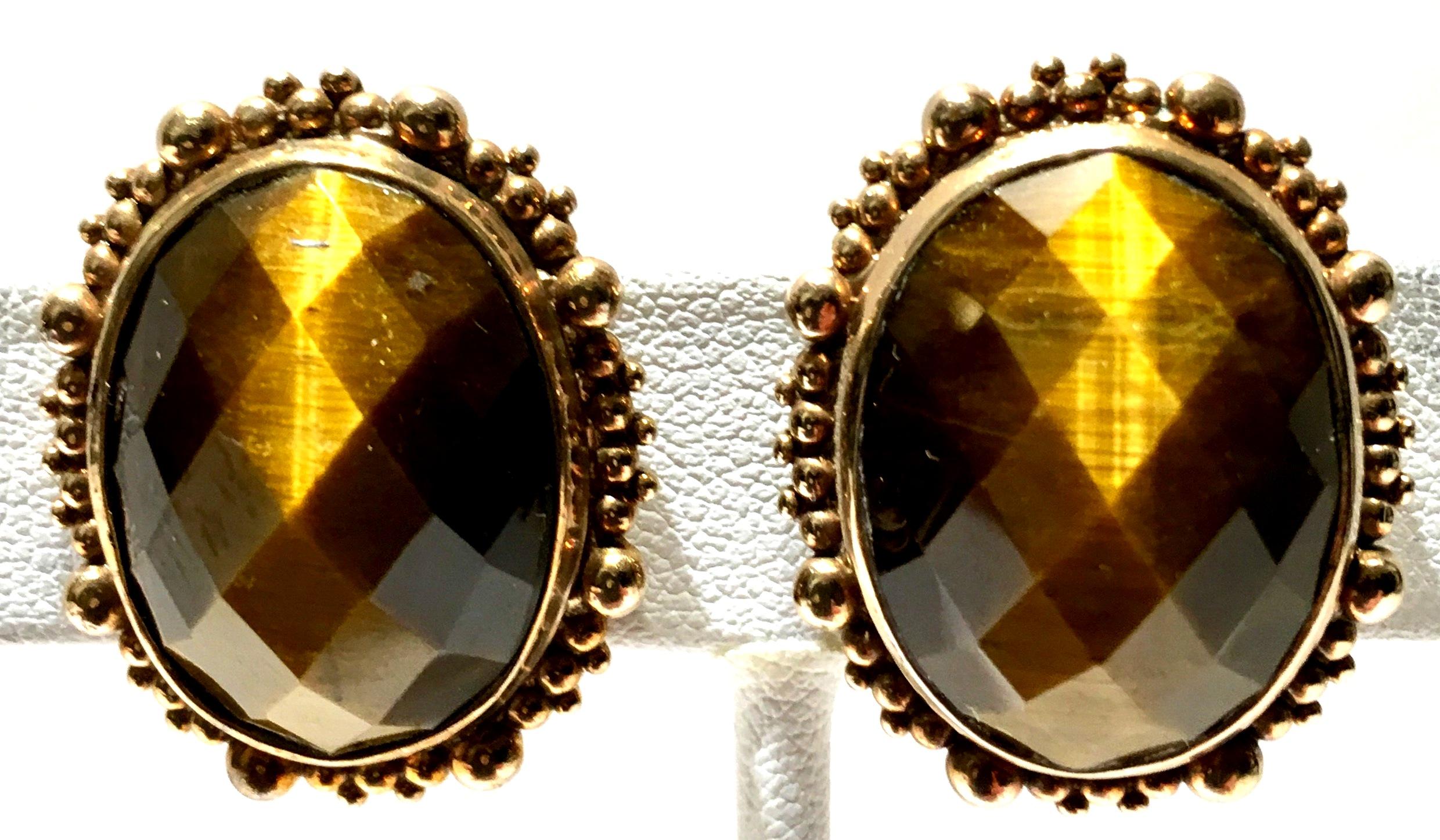 1980'S Sterling Silver Vermeil Bronze Wash Authentic Cut & Faceted Tigers Eye Earrings By, Stephen Dweck.  Features polished cut and faceted tigers eye prong set stones with beaded surround setting detail. These clip style earrings are each signed
