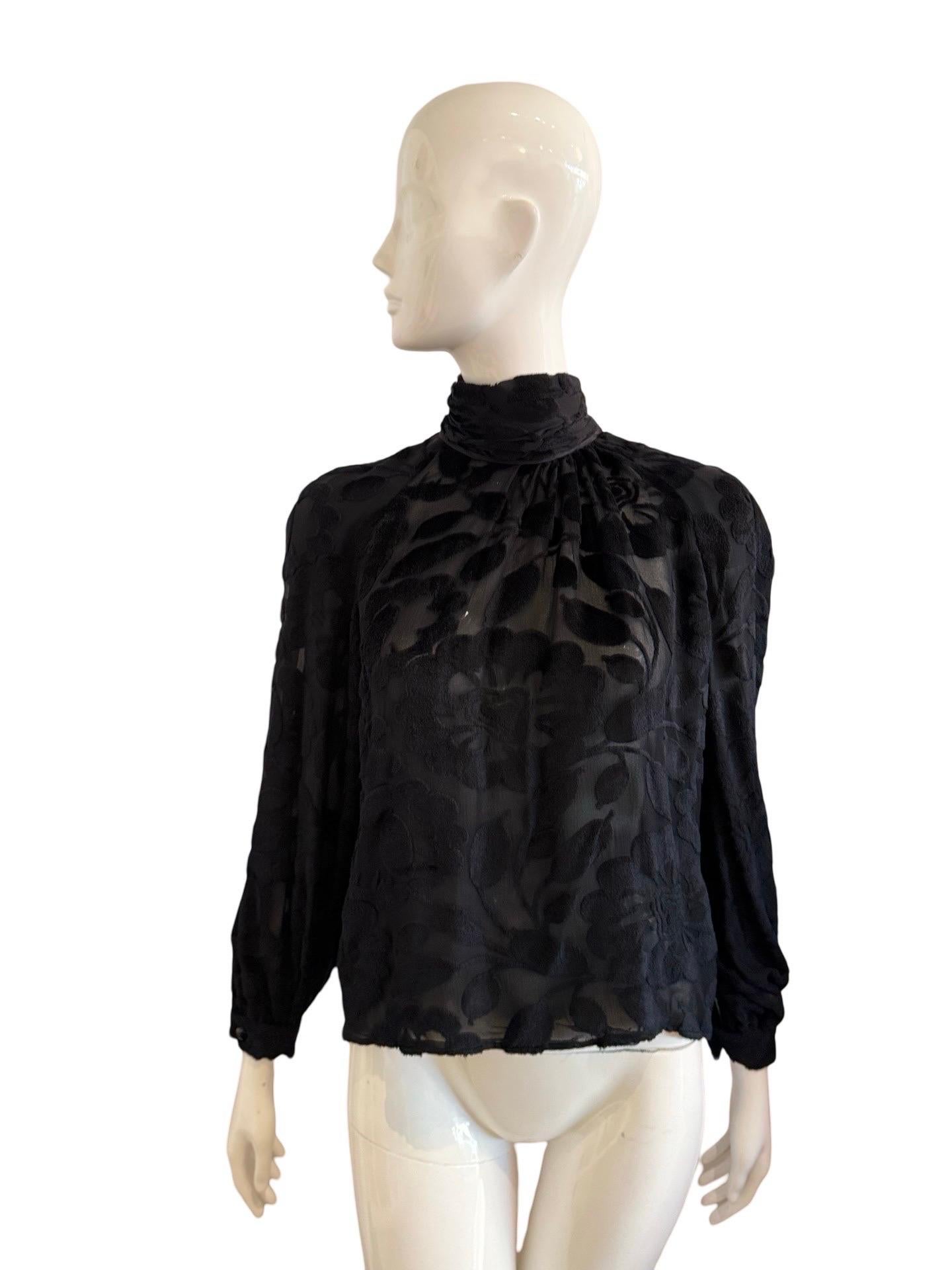 1980s Valentino Boutique sheer silk top with fuzzy velvet burnout floral detailing.  The 'velvet' feels more like a short mohair, it is incredibly soft. The shirt has a gathered turtleneck and buttons up the back.  Flowy and conservative while also