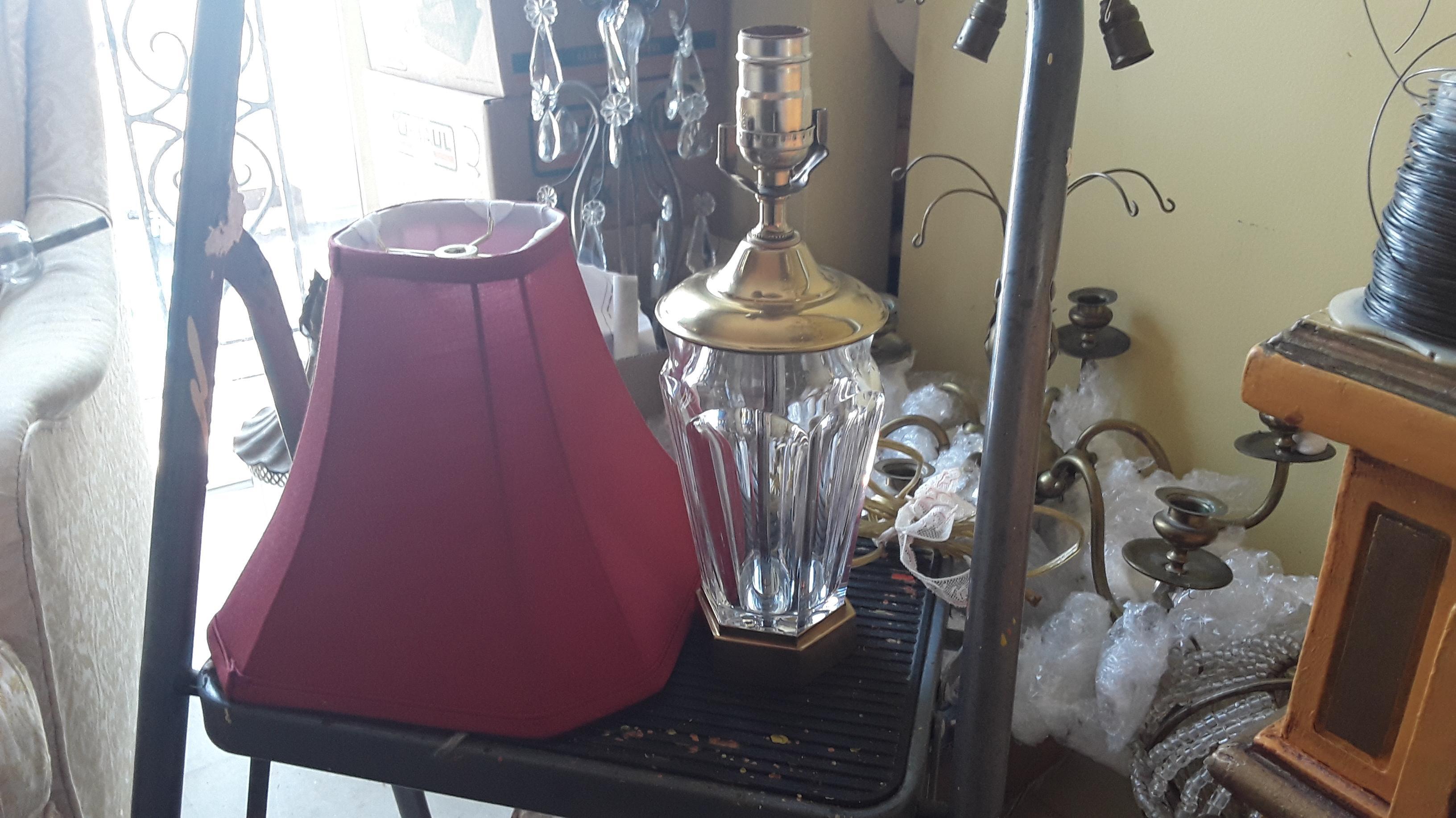 1980's Classic Bevelled Crystal Table Lamp with original Red Shade. This lamp is signed by Baccarat France. Unused condition.