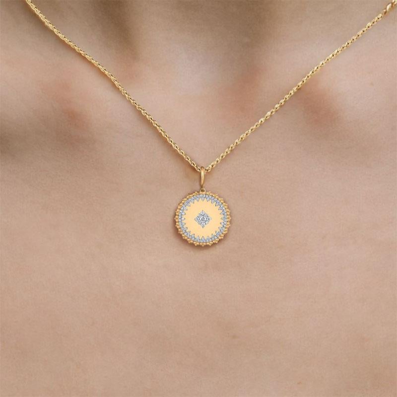 This stunning pendant necklace features a dynamic round design, crafted from 14K yellow gold and adorned with full-cut natural diamonds. The unique motion-inspired design adds a sense of fluid elegance, making this piece a perfect addition to any