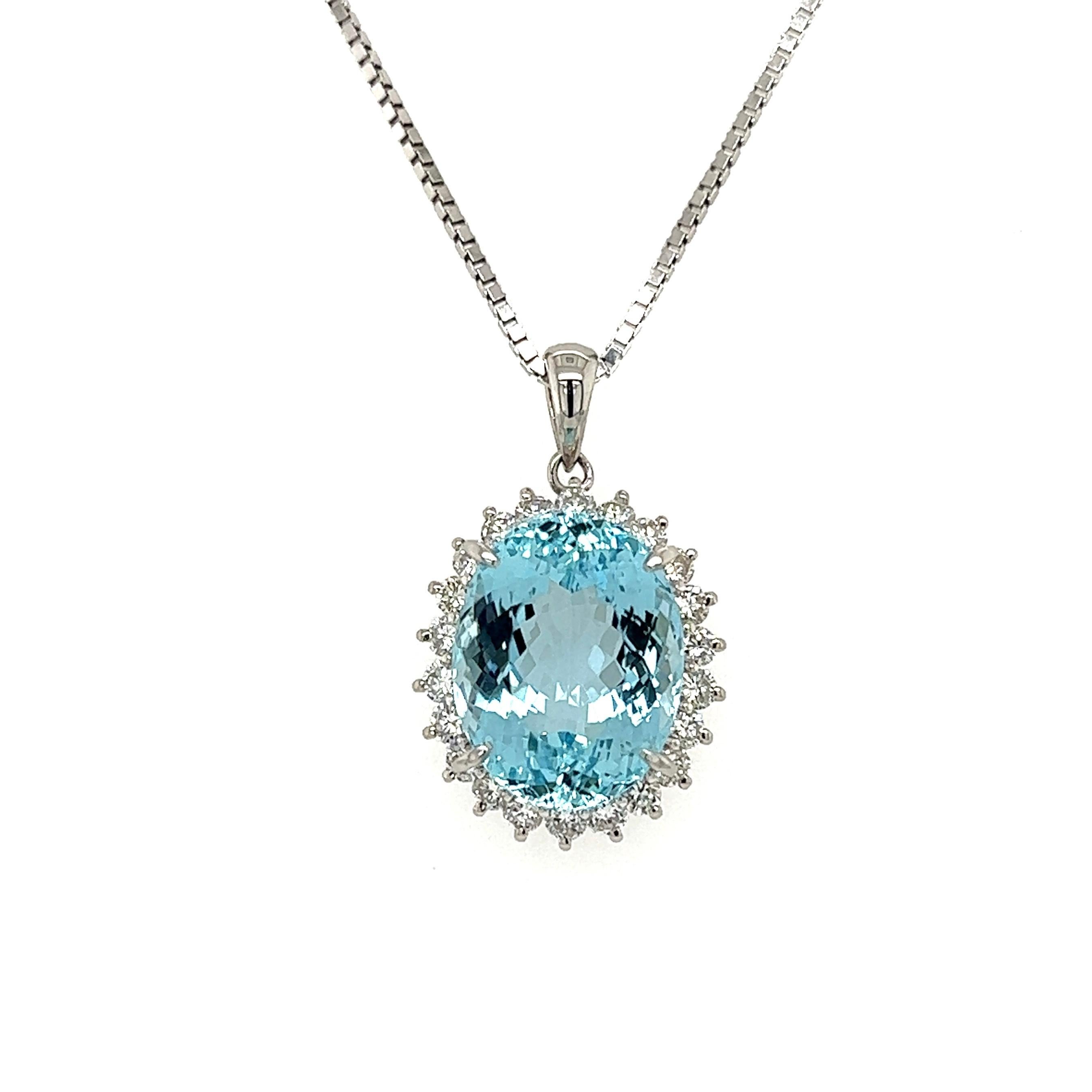 Simply Beautiful! Finely detailed Aquamarine and Diamond Platinum Halo Pendant Necklace. Centering a Hand set 8.10 Carat Aquamarine, surrounded by Diamonds weighing approx. 0.62tcw. Pendant measures approx. 0.94” l x 0.58” w x 0.32” h. Suspended