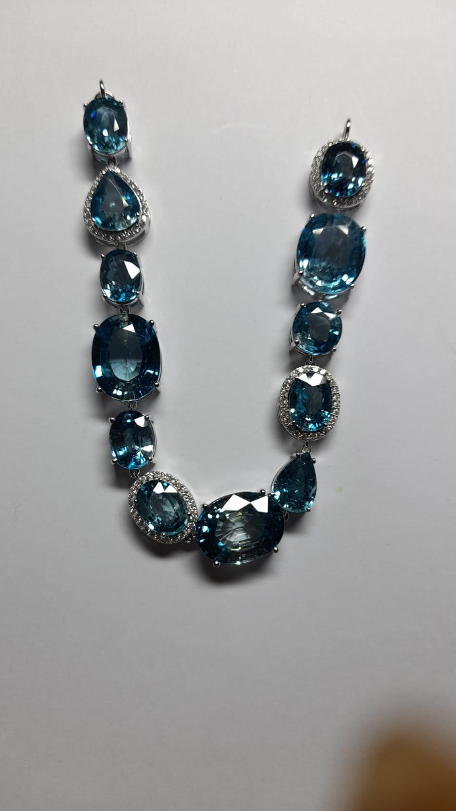 Mixed Cut 81.06 ct Blue Zircon Bracelet With Diamonds Made In 18k Gold For Sale