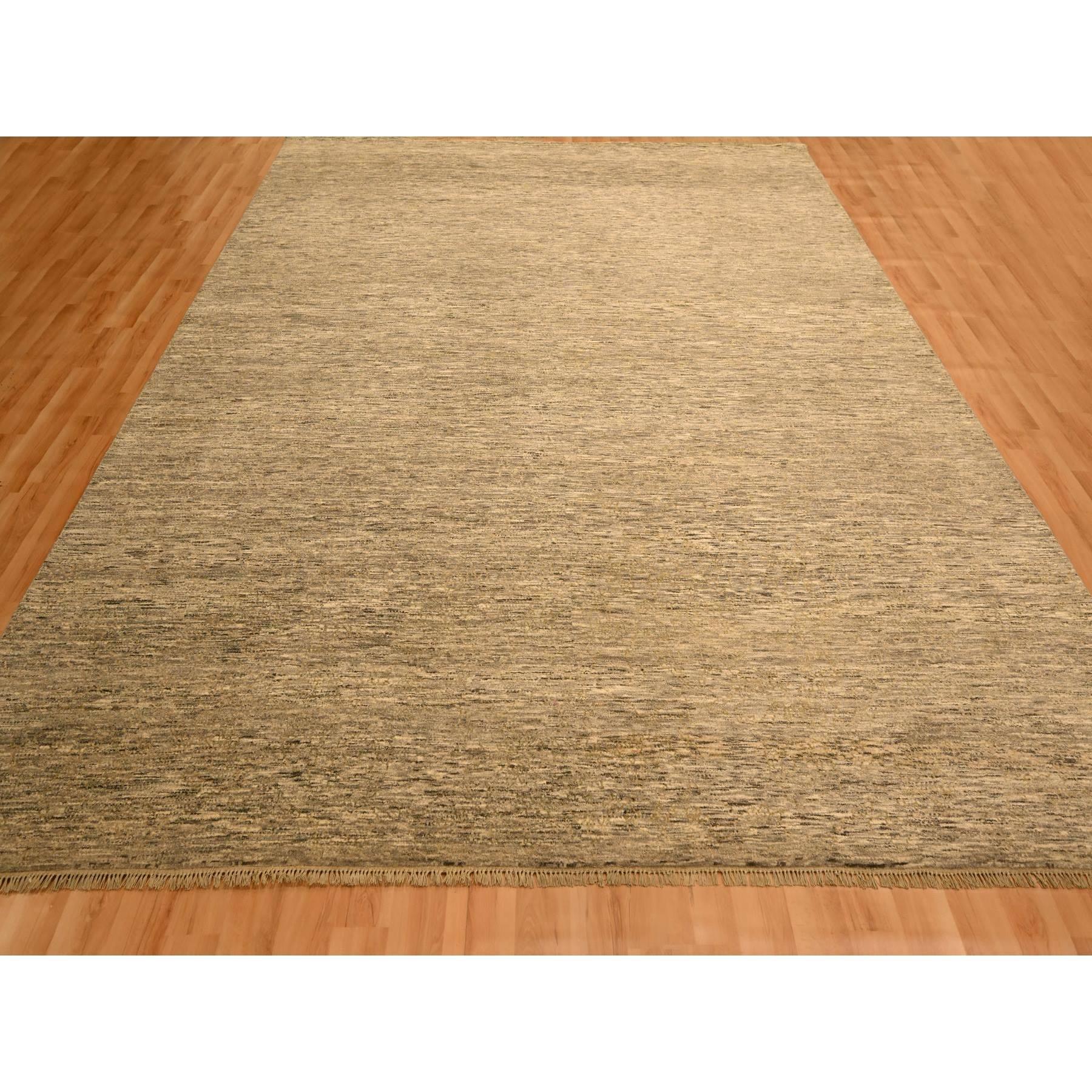 Khaki Brown, Plain Solid Design, Undyed Natural Wool, Tone on Tone, Hand Knotted, Oriental Rug
Primary materials: Wool
Latex: No Pile 
height: 0.25 Inches
Style: Contemporary
Primary color: Brown
Secondary colors: Gray
Pattern: Oriental
