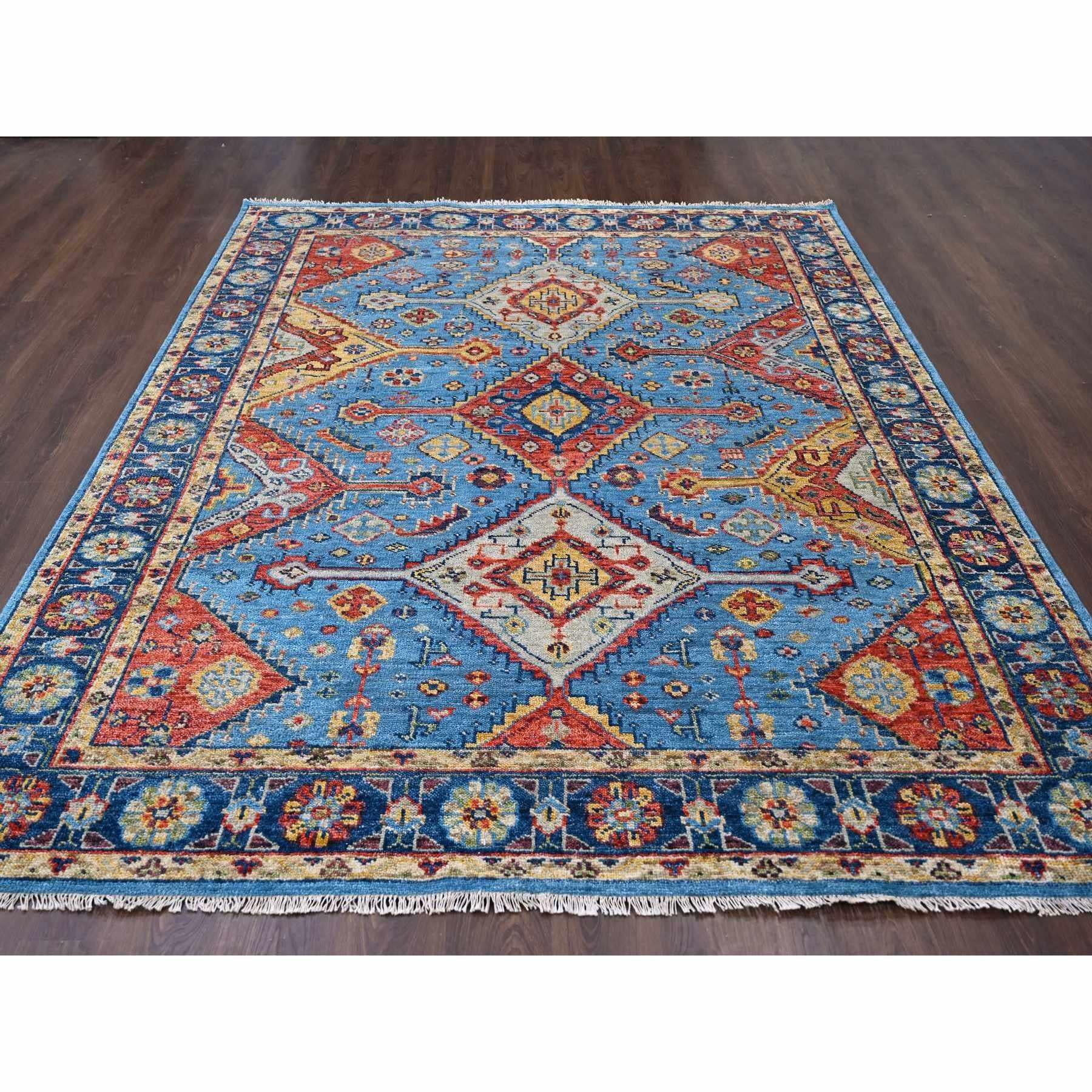 This is a truly genuine one-of-a-kind Light Blue, Hand Knotted Shiraz Design with Serrated Medallions, Supple Collection Pure Wool, Oriental Rug. It has been Knotted for months and months in the centuries-old weaving craftsmanship techniques by