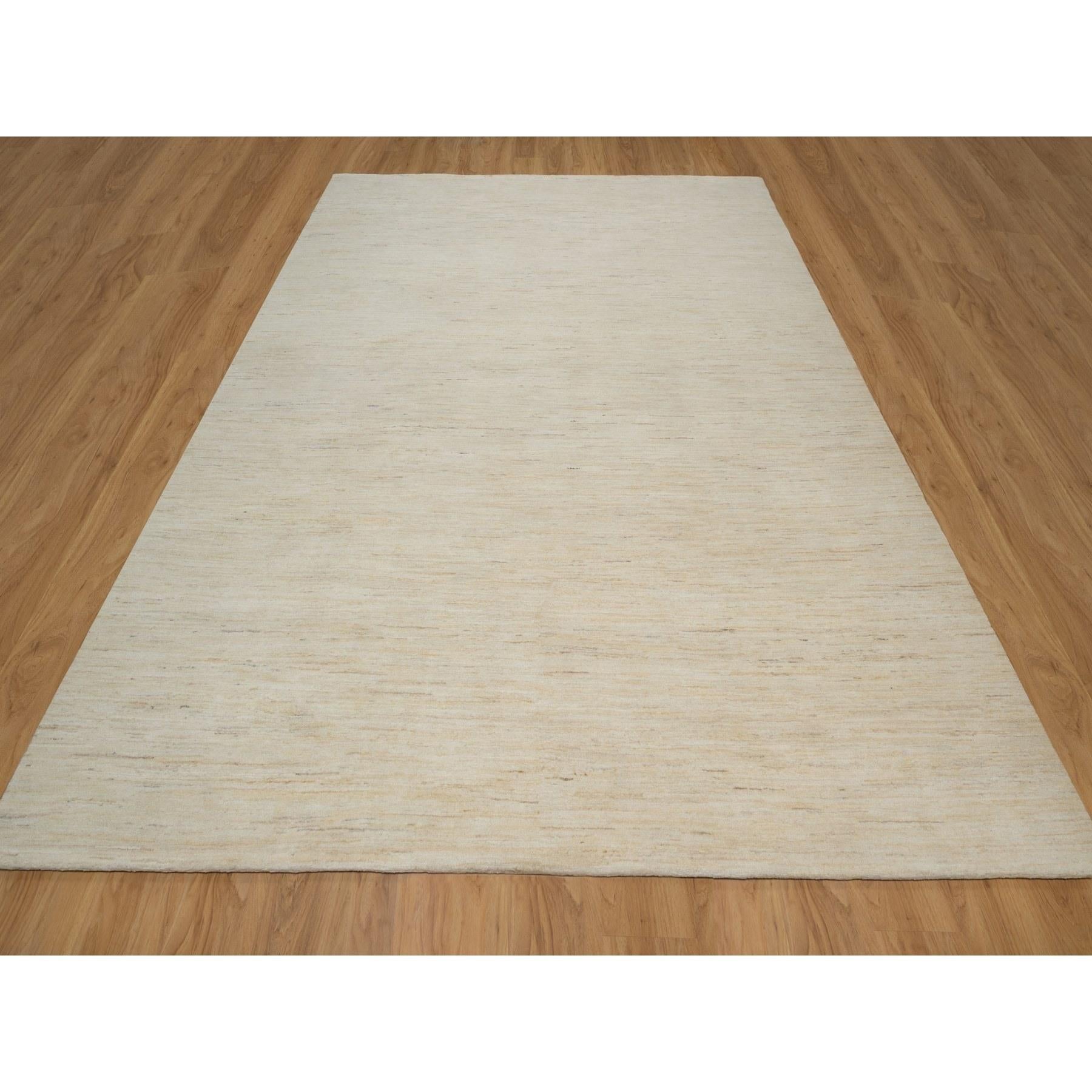 Vanilla Ice White, Modern, Plain Design, Lori Buft Gabbeh, Thick and Plush, Pure Wool, Hand Knotted, Oriental Rug
Primary materials: Wool
Latex: No Pile 
height: 0.25 Inches
Style: Contemporary
Primary color: Ivory
Secondary colors: None
Pattern: