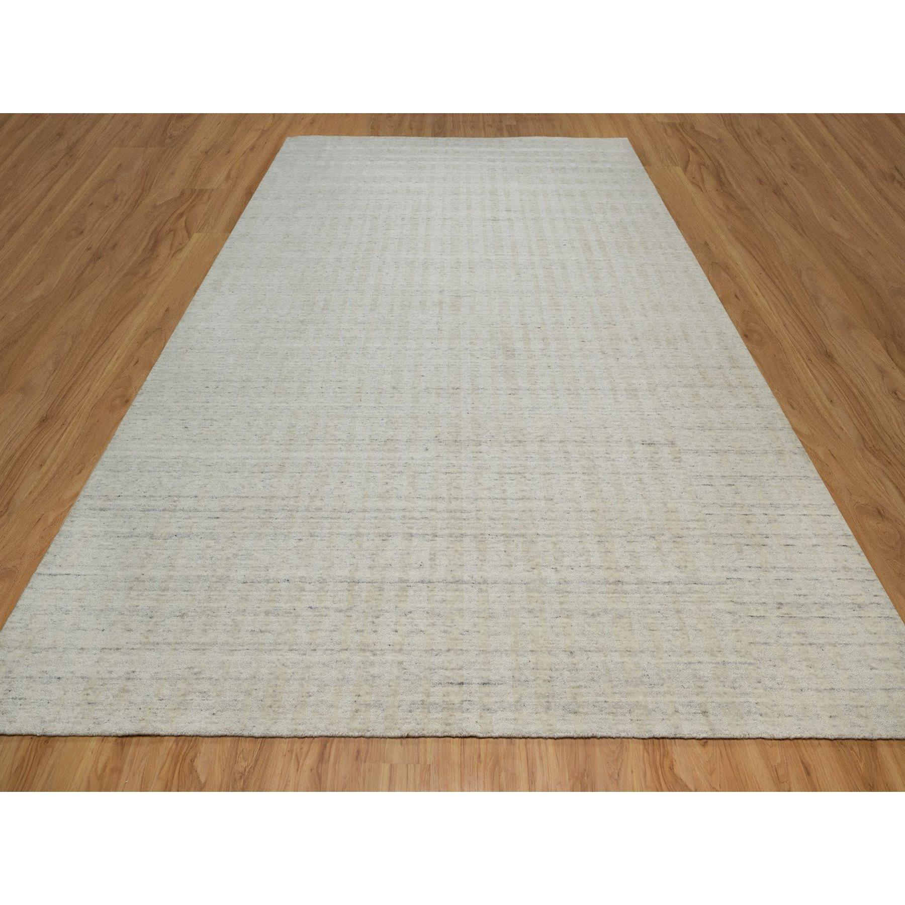 Bianco osso, disegno a strisce verticali con effetto sale e pepe, tessuto a mano, lana naturale non tinta, tappeto orientale
Materiali primari: Lana
Lattice: No Pile 
altezza: 0,25 pollici
Stile: Contemporaneo
Colore primario: Avorio
Colori