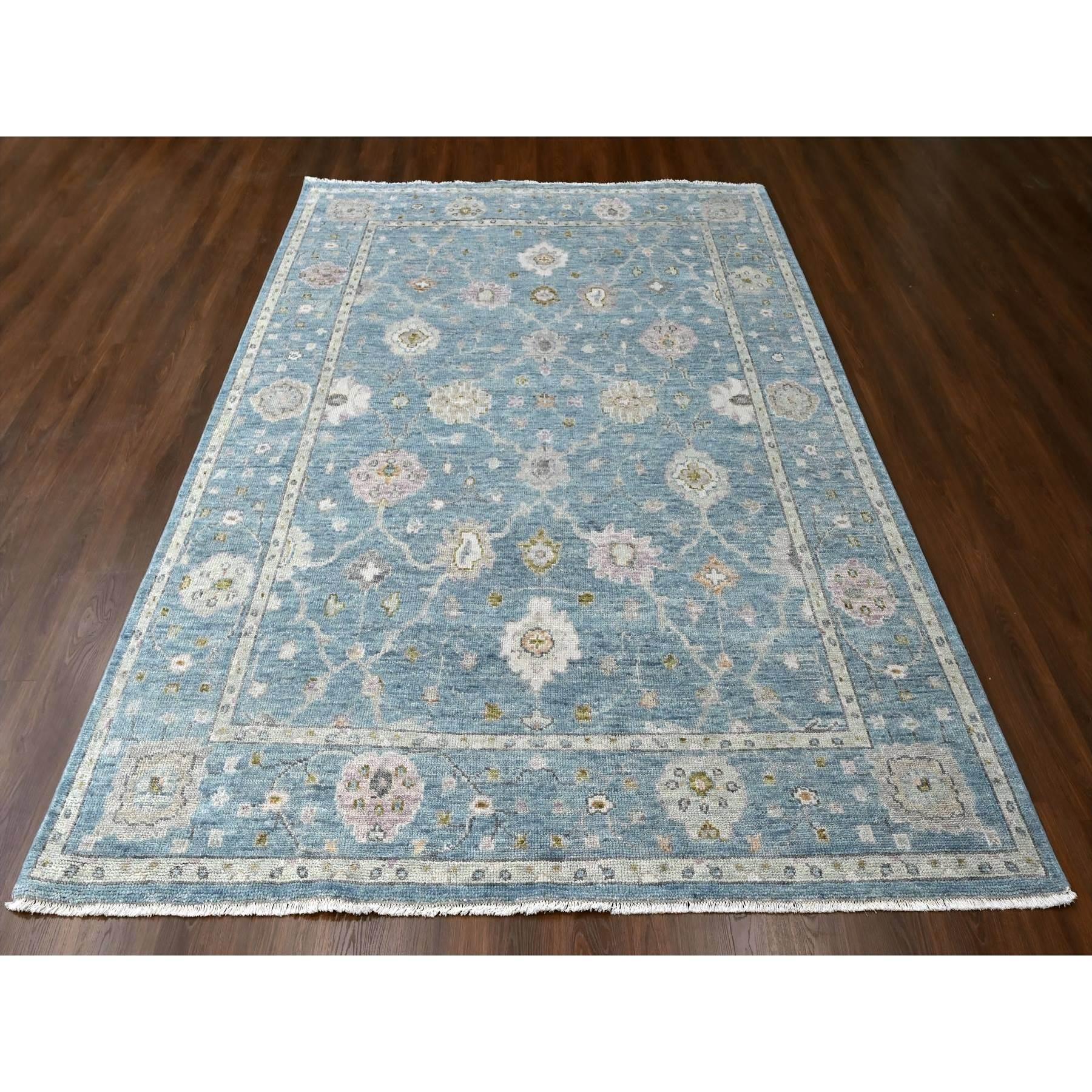 Cerulean Blue, Supple Collection, Organic Wool, Hand Knotted, Oushak Design, Soft and Plush Pile, Oriental Rug
Primary materials: Wool
Latex: No Pile 
height: 0.25 Inches
Style: Transitional
Primary color: Blue
Secondary colors: Pink, Ivory, Beige,