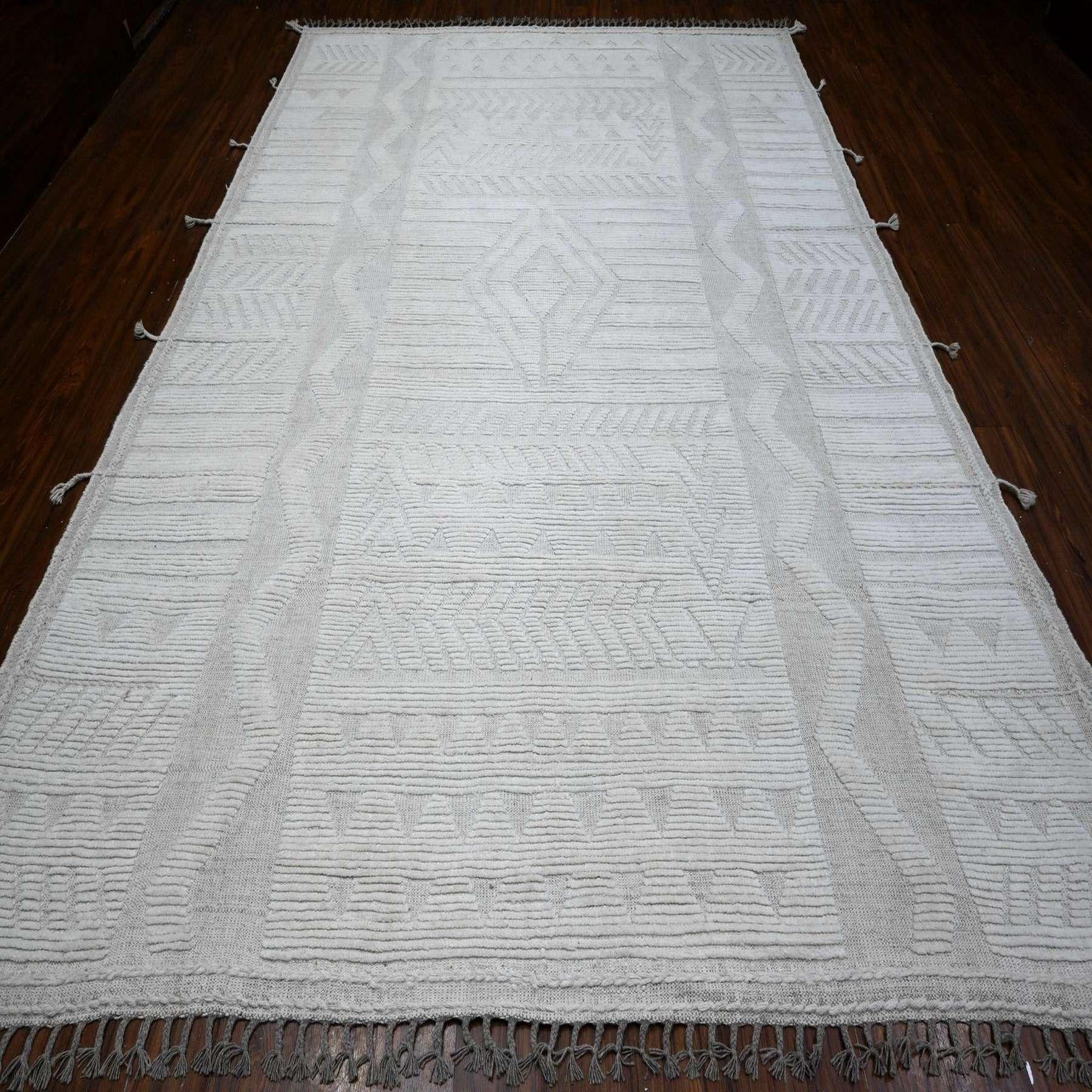 This is a truly genuine one-of-a-kind Moroccan Weave, Hand Knotted, Pure Wool, Oriental Rug. It has been Knotted for months and months in the centuries-old weaving craftsmanship techniques by expert artisans.
Primary materials: Wool
Latex: No Pile