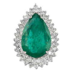 Bague en or blanc 18 carats avec émeraude de 8,11 carats et double halo de diamants