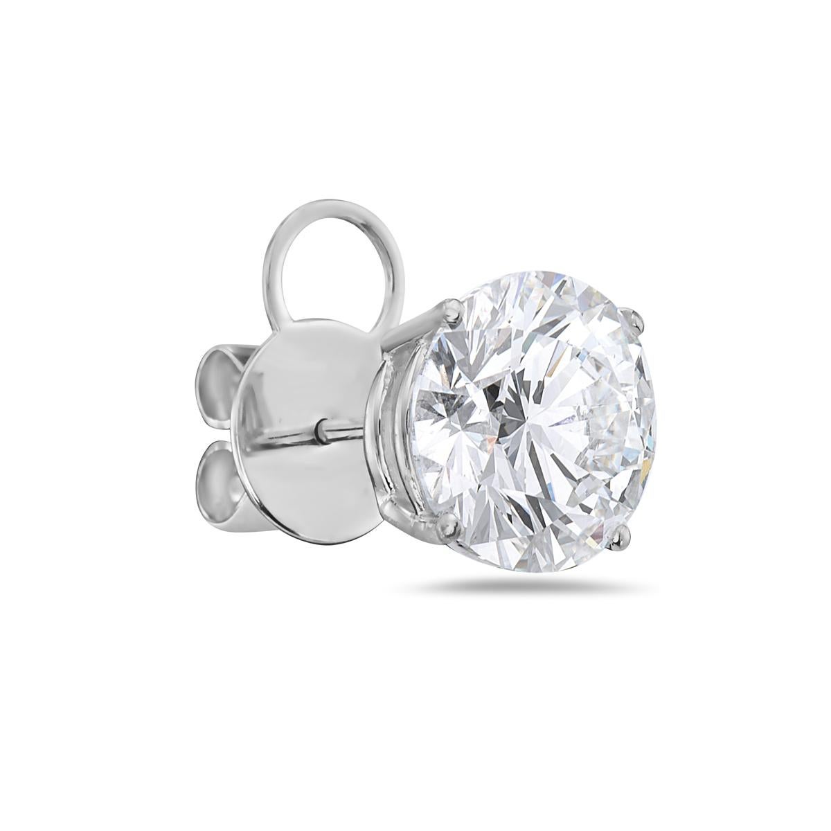 These diamond stud earrings feature two G VS1 diamonds weighing 4.03 and 4.08 carats each, xxx no fluorescence. Mounted in 18K white gold 4 prong setting. GIA certified. Report No. 5171427180/5172546076.

Viewings available in our NYC showroom by