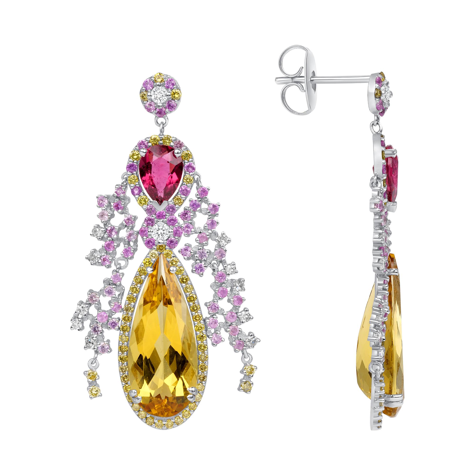These are one-of-a-kind, hand-fabricated earrings with 8.11 carats of hand-cut 19-millimeter by 8-millimeter yellow beryl pears from Idar Oberstein, Germany. They also feature 1.3 carats of specially cut 7-millimeter by 5-millimeter rubellite pears,